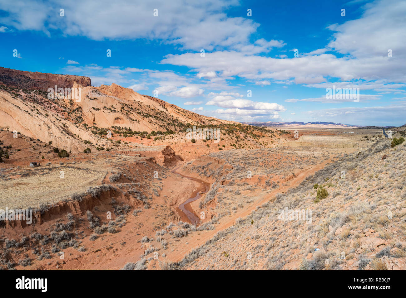 Coral pink colored valley and mountains and Laguna Creek at Tsegi