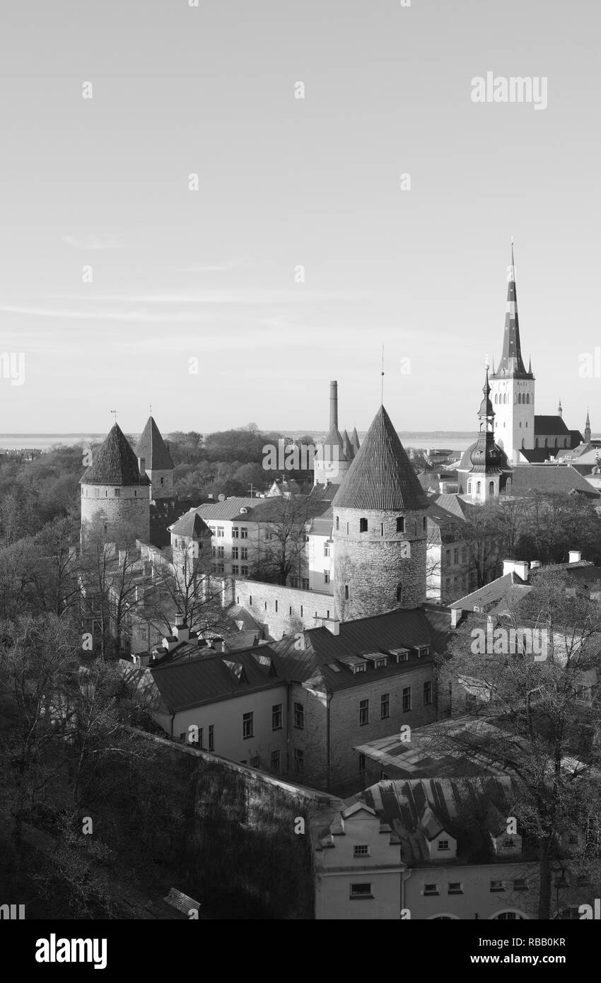 Medieval towers in the city wall around Tallinn, capital city of Estonia, on a sunny day - monochrome processing Stock Photo