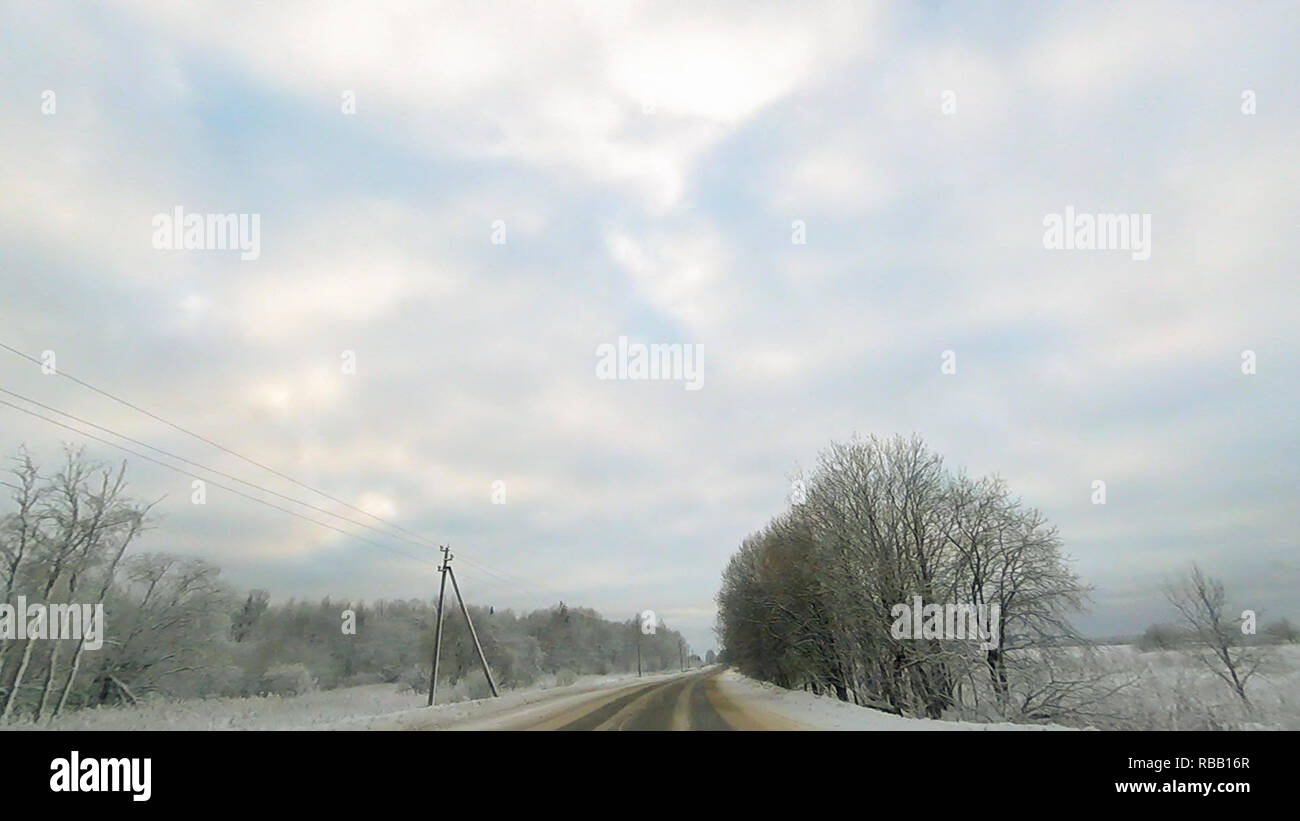 Country road in winter along the forest with white snow trees Stock ...