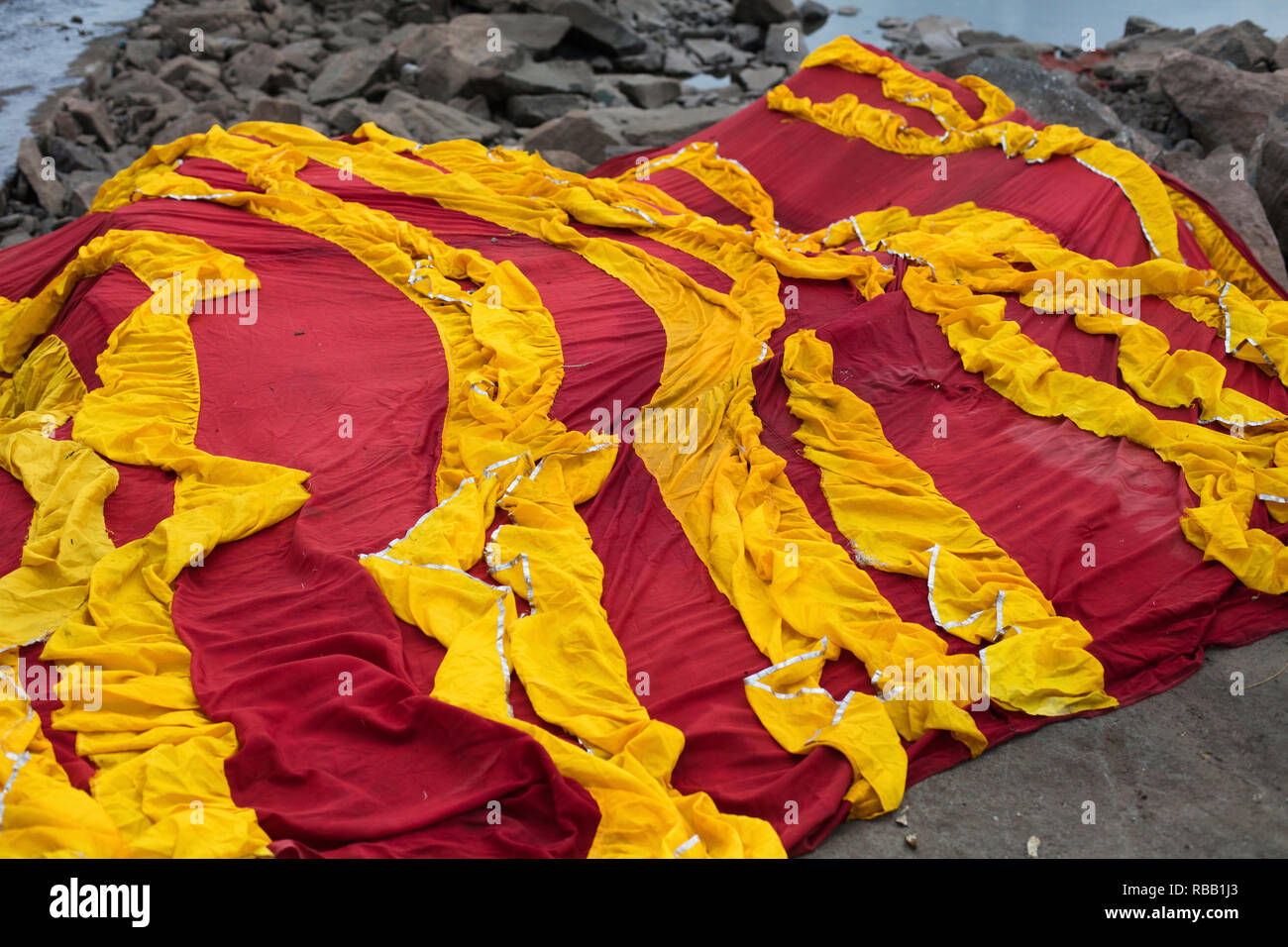 Fabric drying on stone in India Stock Photo