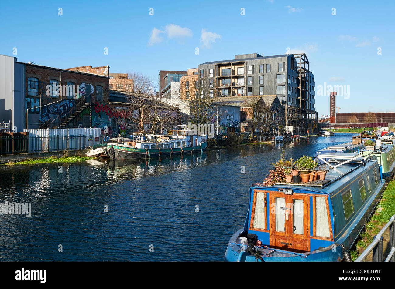 Warehouses and apartments along the River Lea near Hackney Wick, East London, UK Stock Photo
