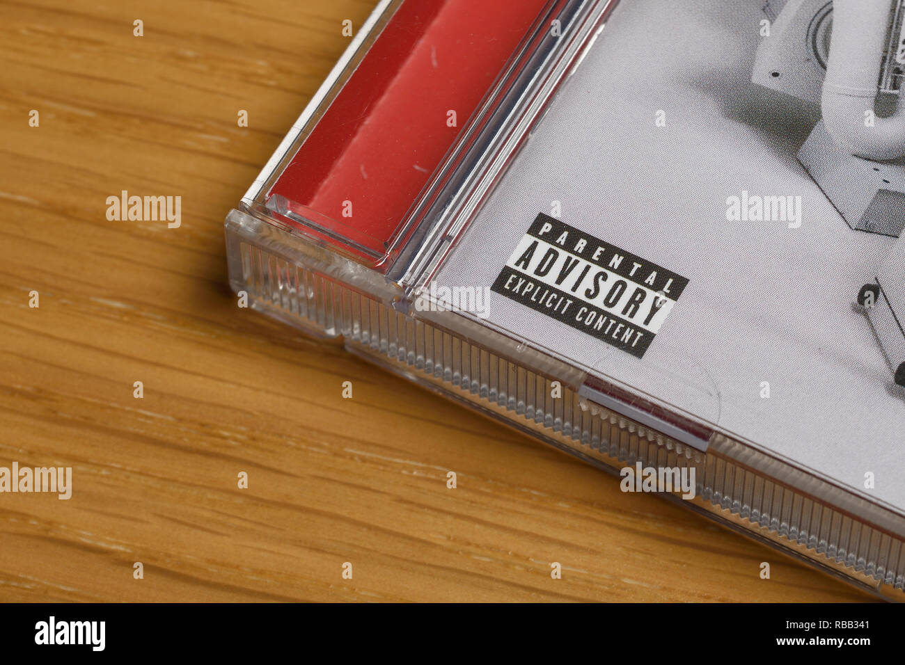 A Parental Advisory label on a compact disc case Stock Photo
