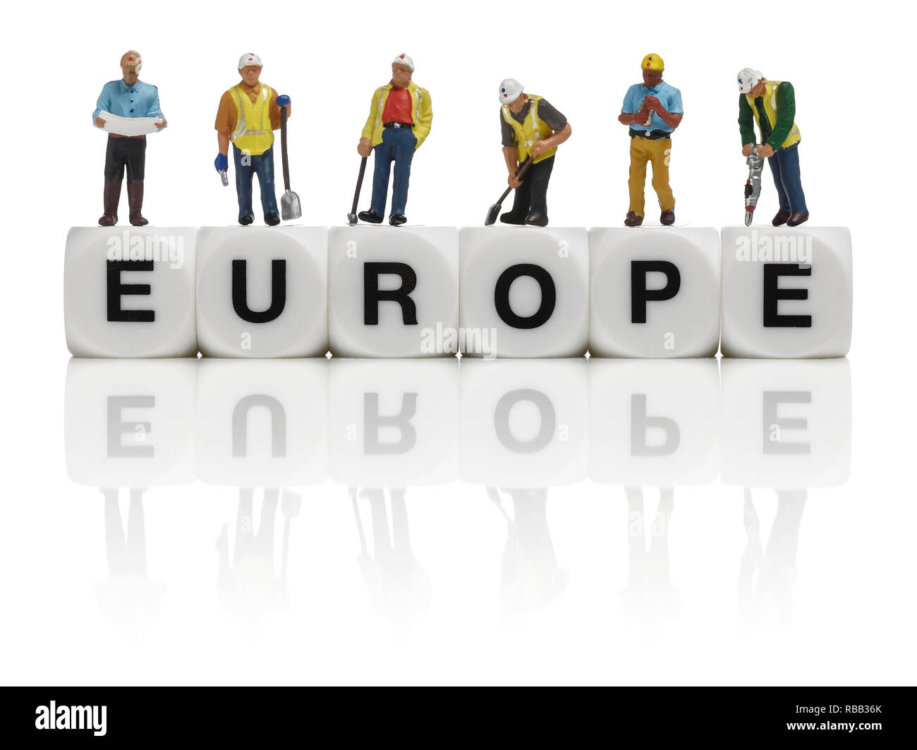 Construction workers and the word Europe Stock Photo
