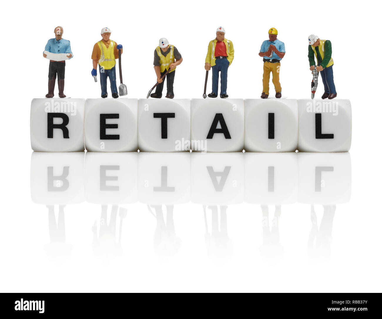 Construction workers and the word Retail Stock Photo