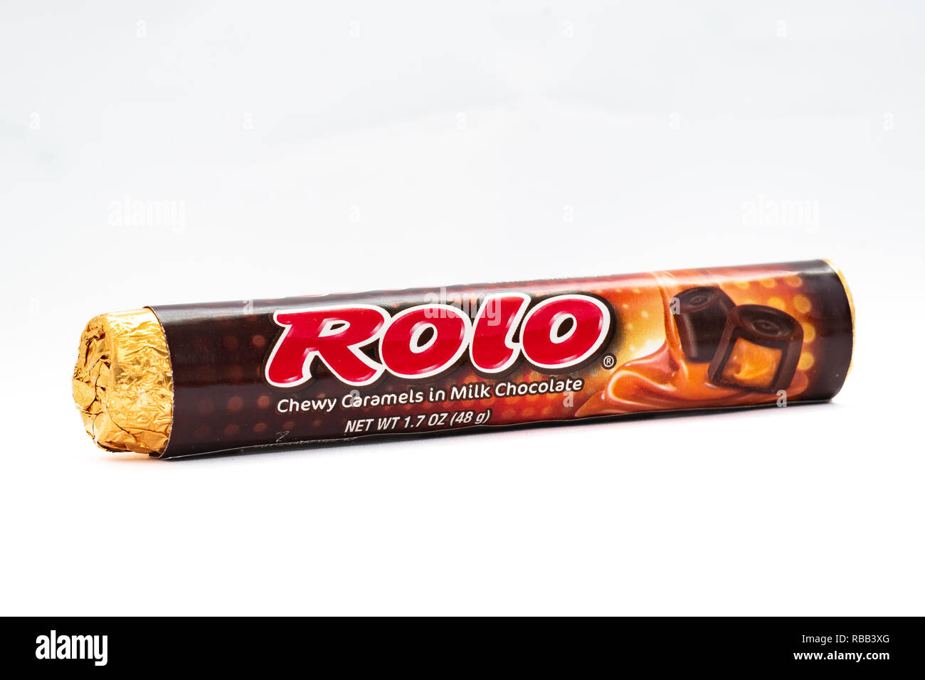A roll of Hershey's Rolo Chewy Caramels covered with milk chocolate. Stock Photo