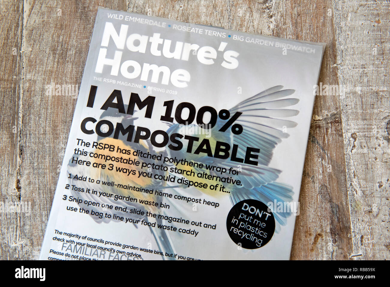 Compostable, biodegradable vegan packaging, cover or bag from RSPB's magazine made from potato starch. Stock Photo