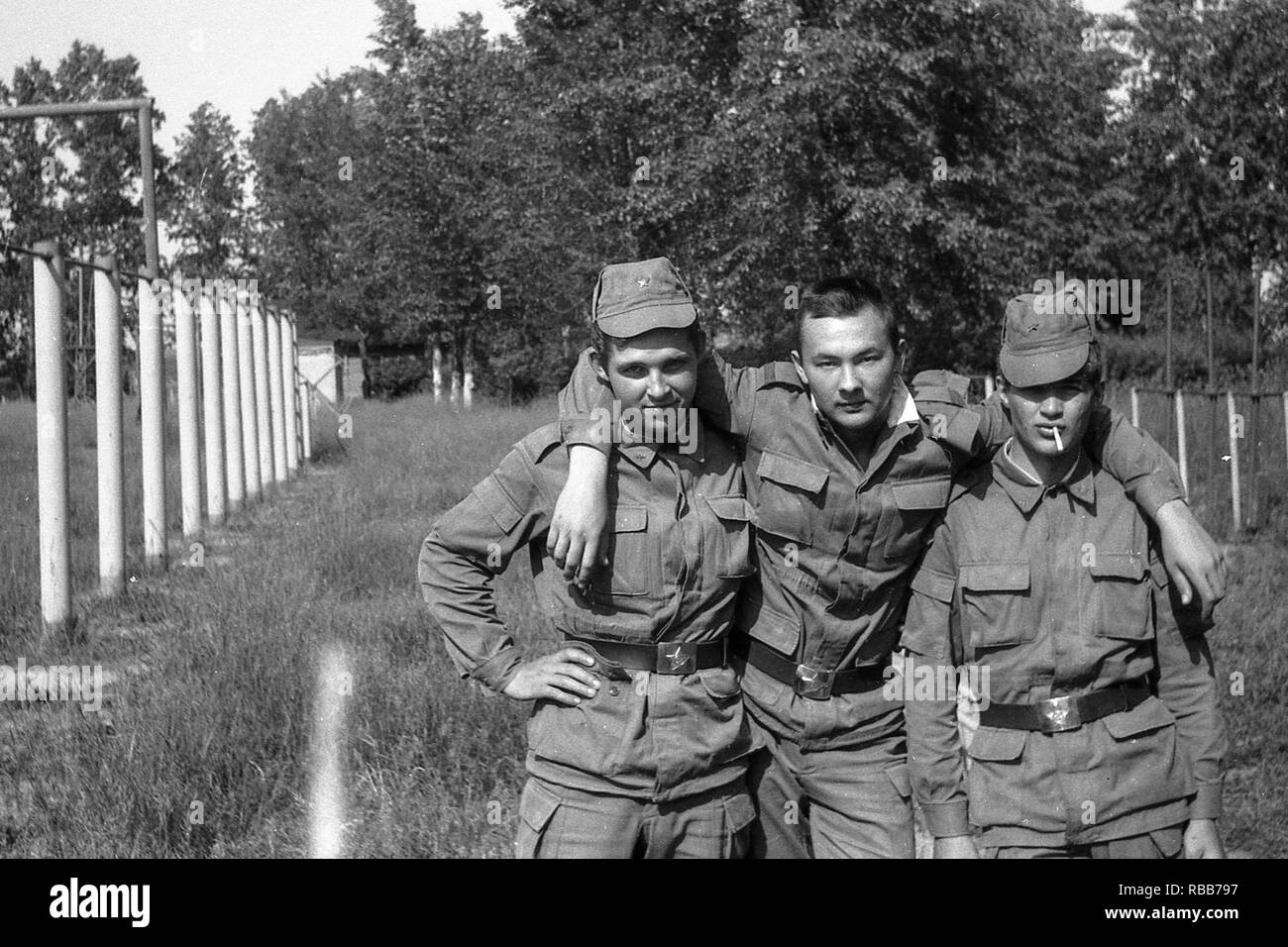 MOSCOW REGION, RUSSIA - CIRCA 1992: Soldiers of the Russian army on the sports field. Film scan. Large grain. Stock Photo