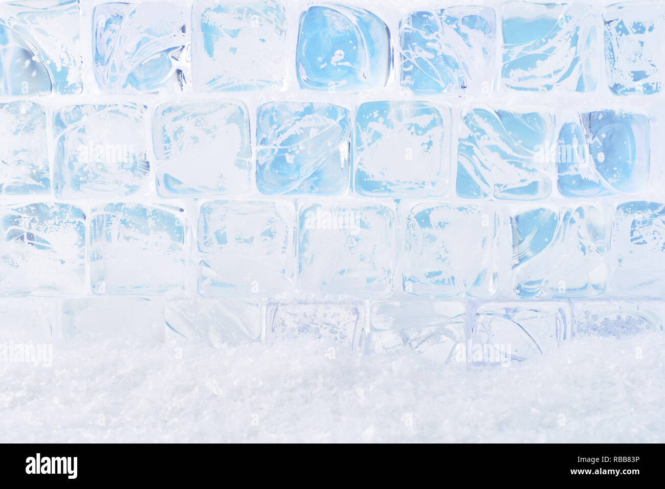 Ice cubes with snow background. Copy space for text or design element. Stock Photo