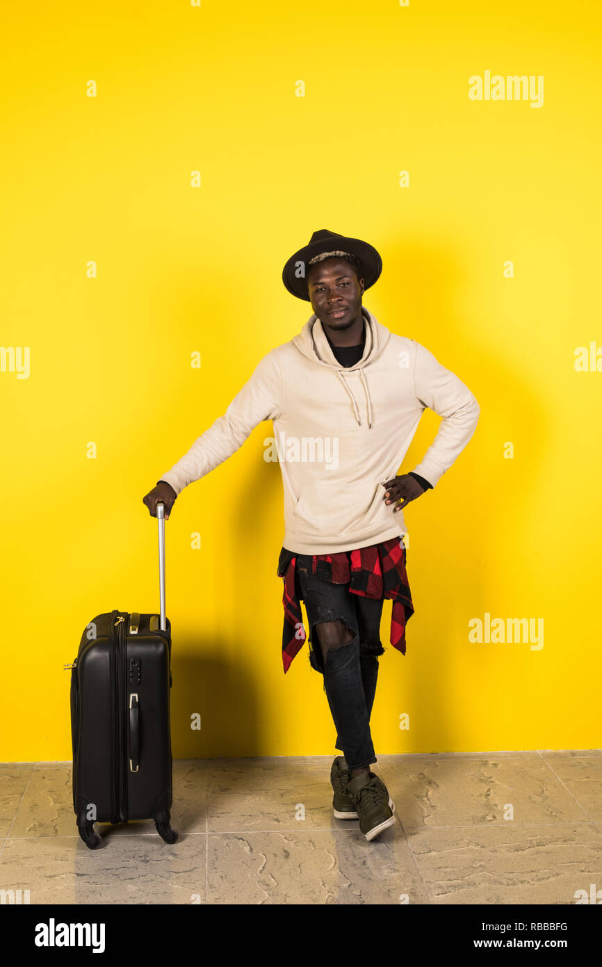 Young man looking sad suitcase hi-res stock photography and images - Alamy