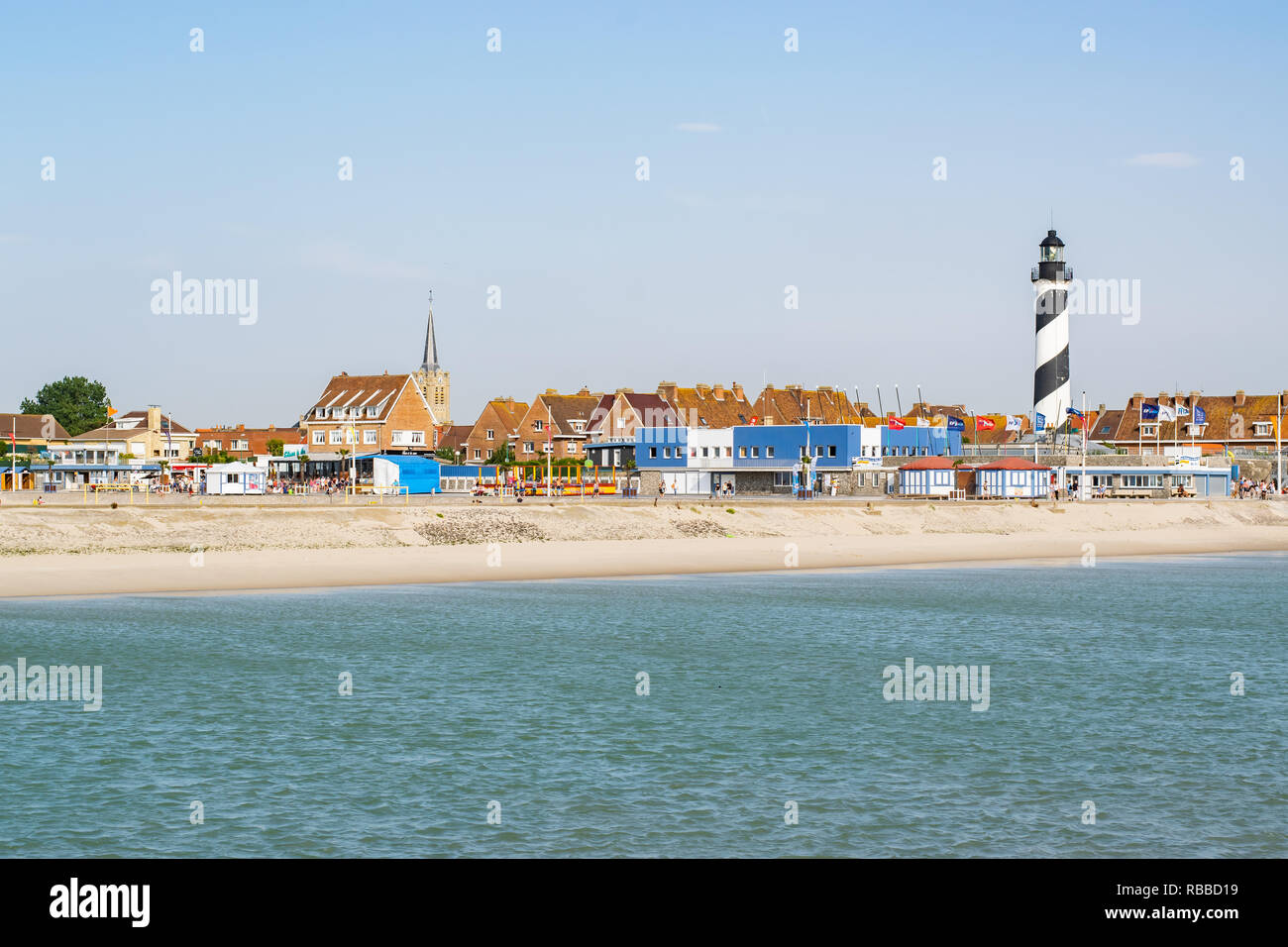 Gravelines,Petit-Fort Philippe,FRANCE-July 19,2017: View of the lighthouse, river and buildings of the small town of Petit-Fort-Philippe. Stock Photo