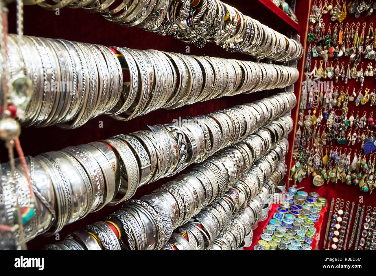Silver bracelets on display in a souk Stock Photo