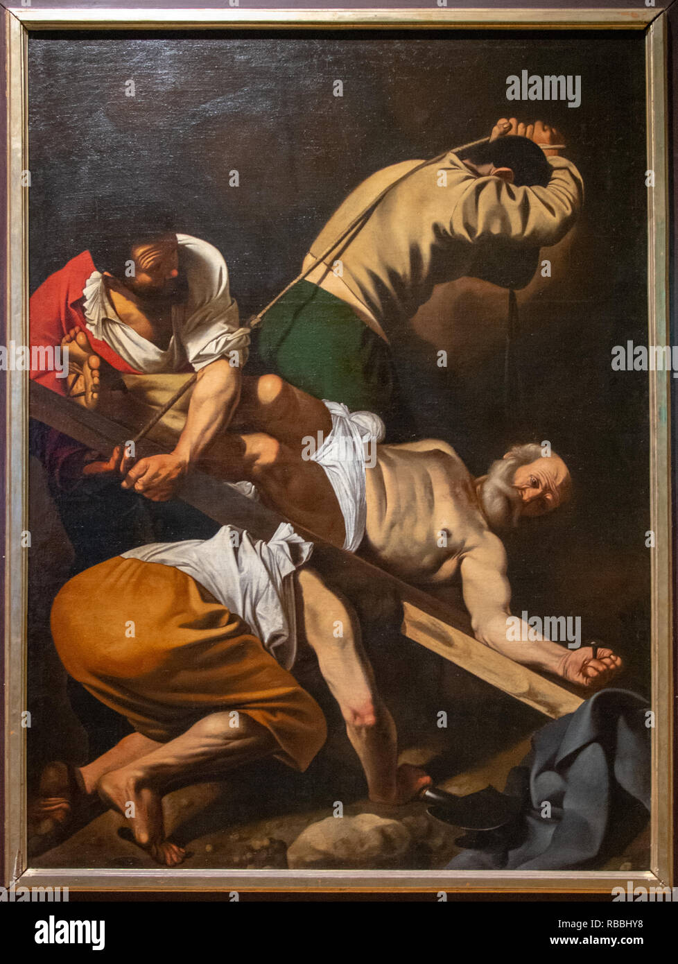 'the crucifixion of Saint Petrus' by Michelangelo Merisi / Caravaggio Stock Photo