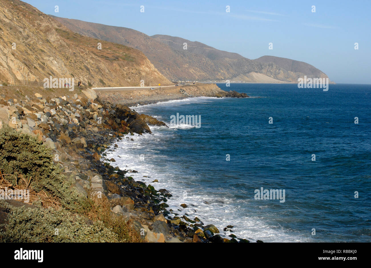 The rugged Pacific Ocean coastline along the Pacific Coast Highway is pictured at Point Mugu, California, located between Oxnard and Malibu. Stock Photo