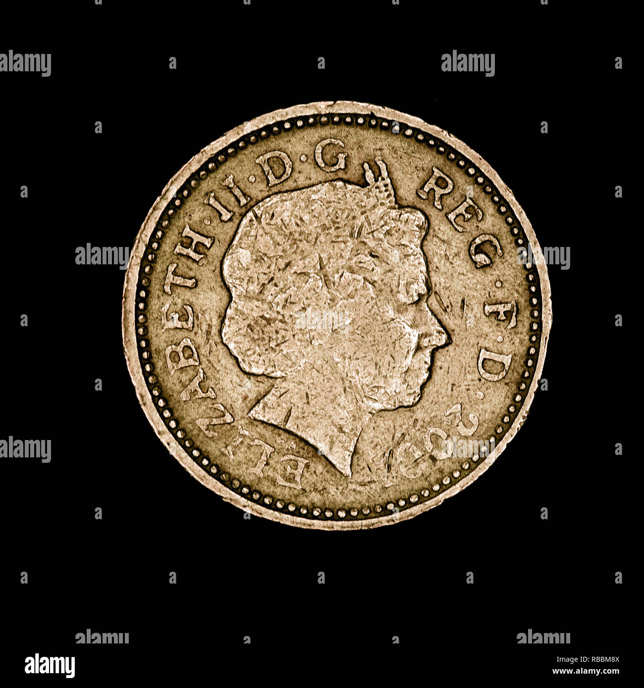 One old british pound coin on black background Stock Photo