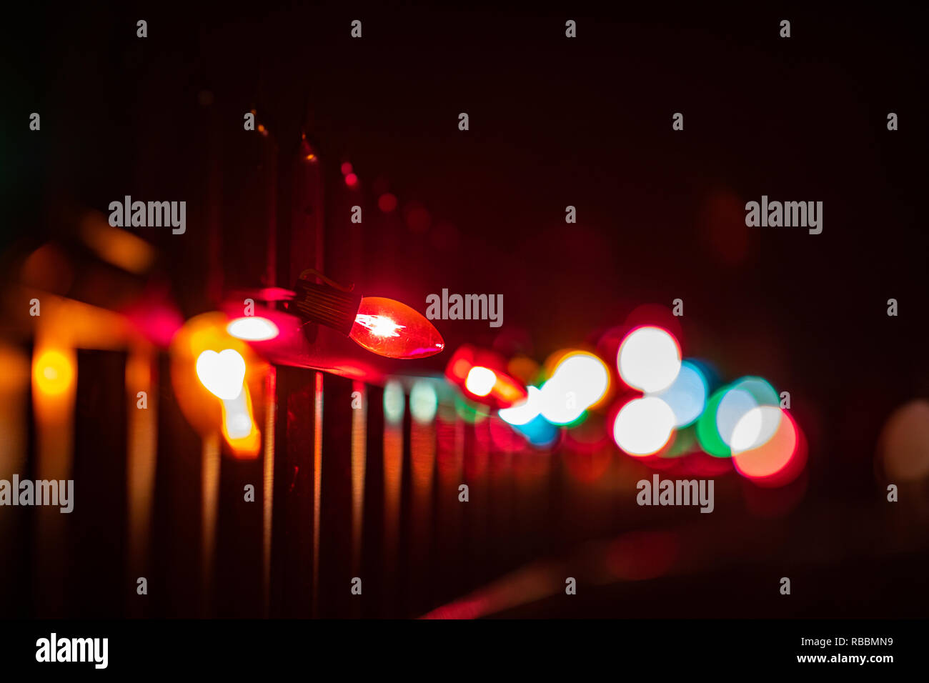 Christmas Lights on a fence in Indiana Stock Photo
