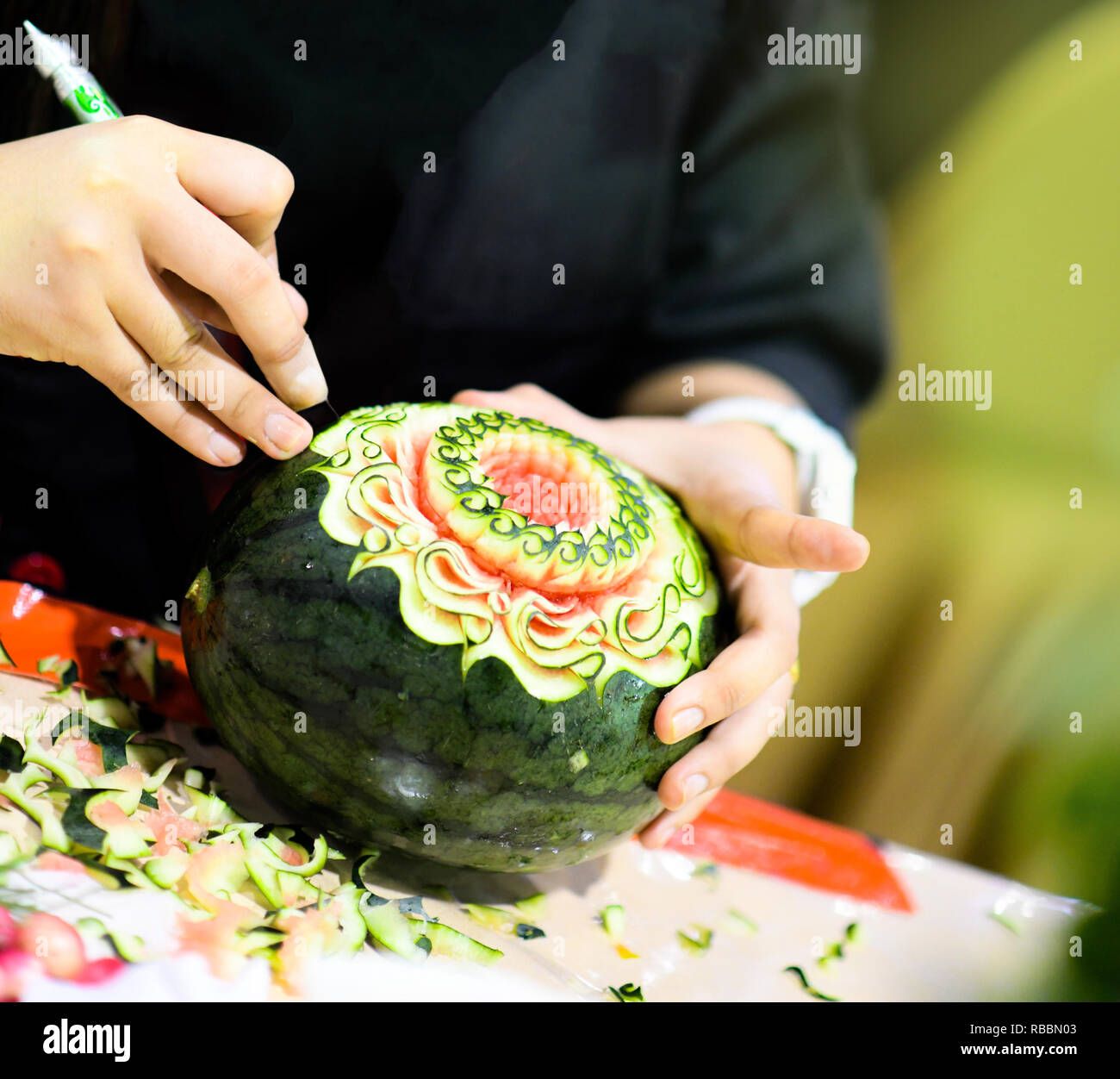 Thai fruit carving with hand, Vegetable and Fruit Carving Stock Photo