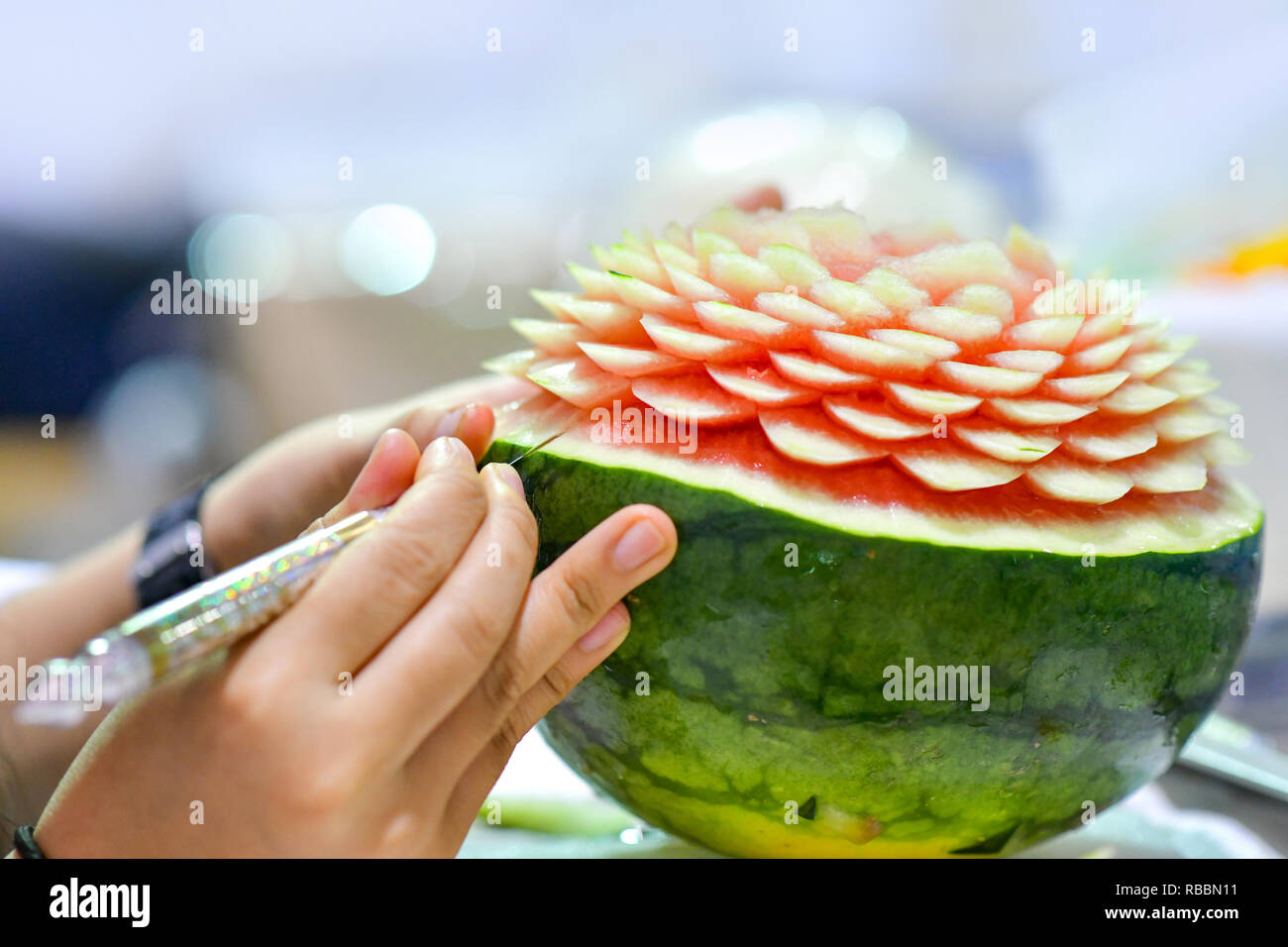 Thai fruit carving with hand, Vegetable and Fruit Carving Stock Photo -  Alamy