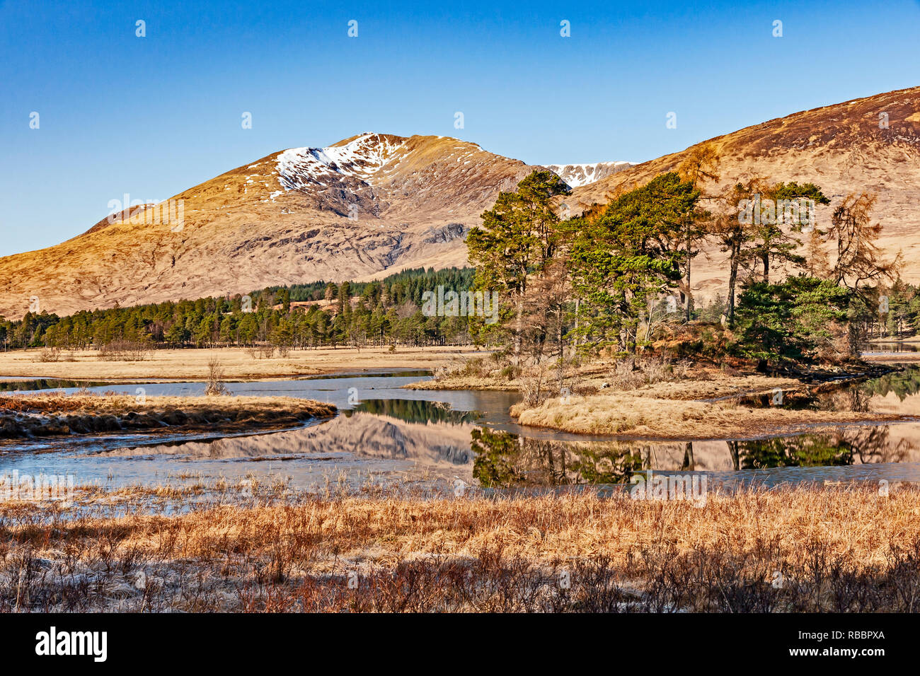 Scottish mountain Stob Ghabhar, Forest Lodge and Loch Tulla at the Black Mount near Bridge of Orchy in Highland Scotland Stock Photo