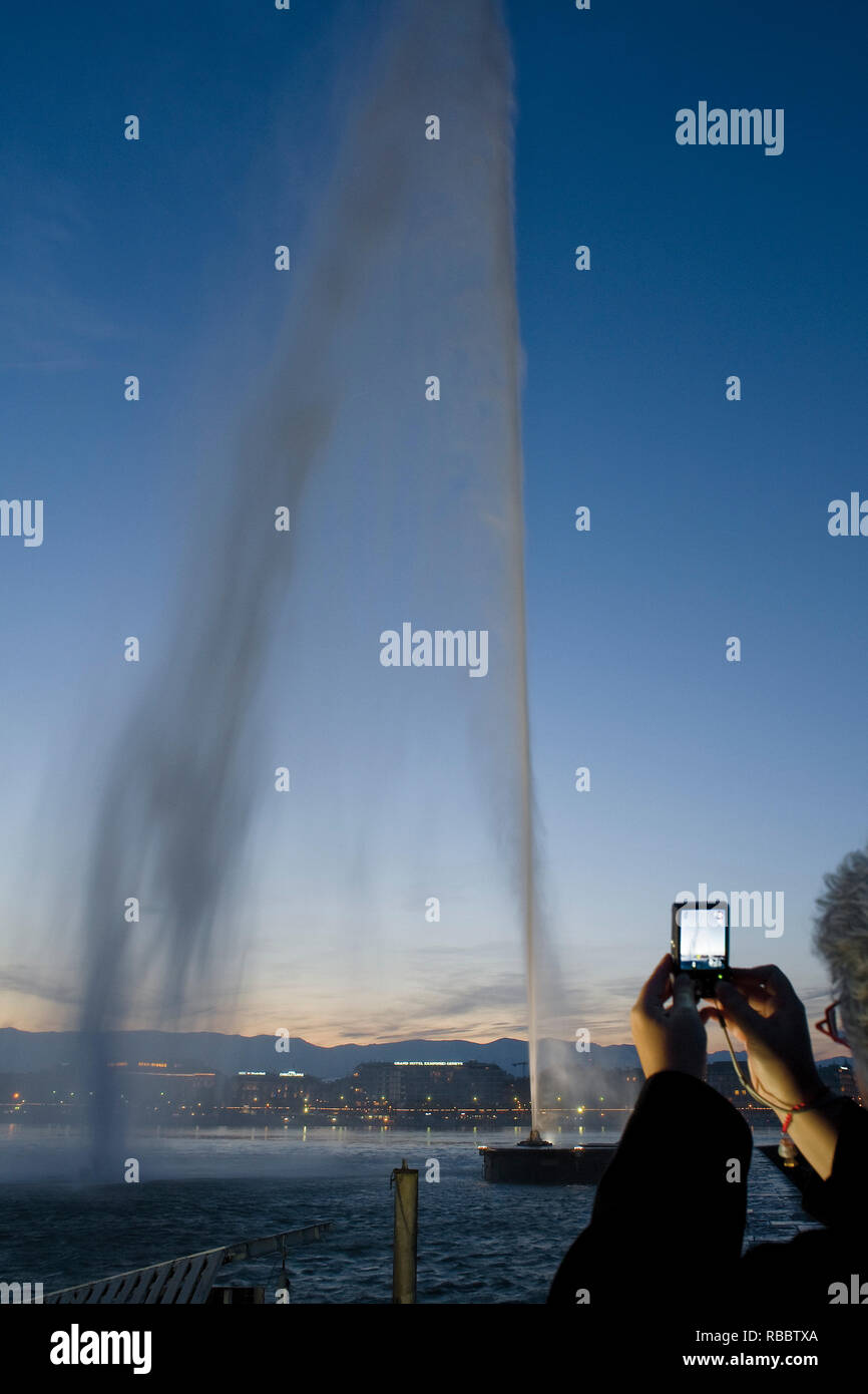 the water jet is the huge Fountain on the Geneva Lake, in the city of ...