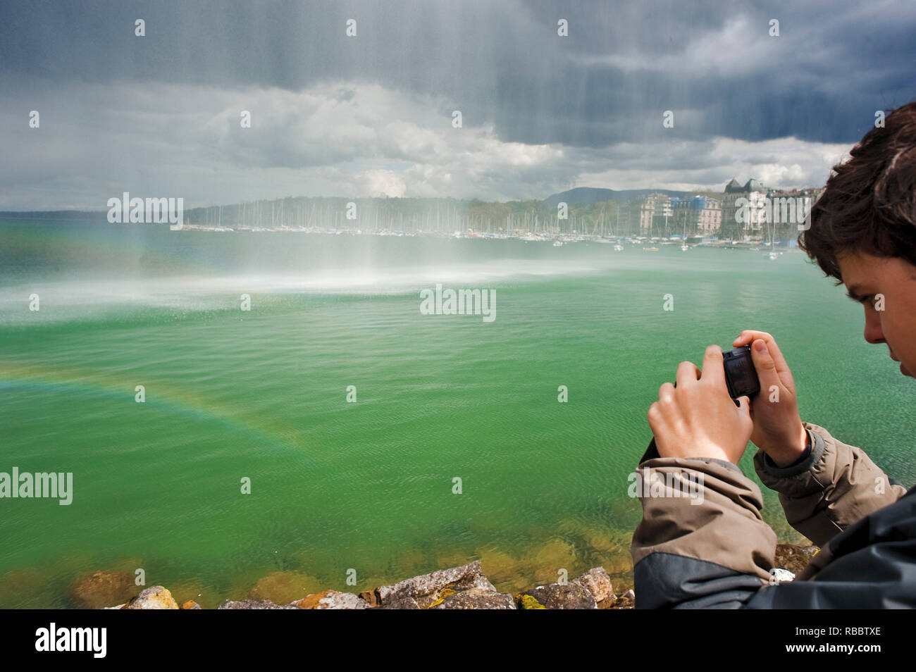 Rainbow on the water jet on the Geneva Lake, in the city of Geneva ...