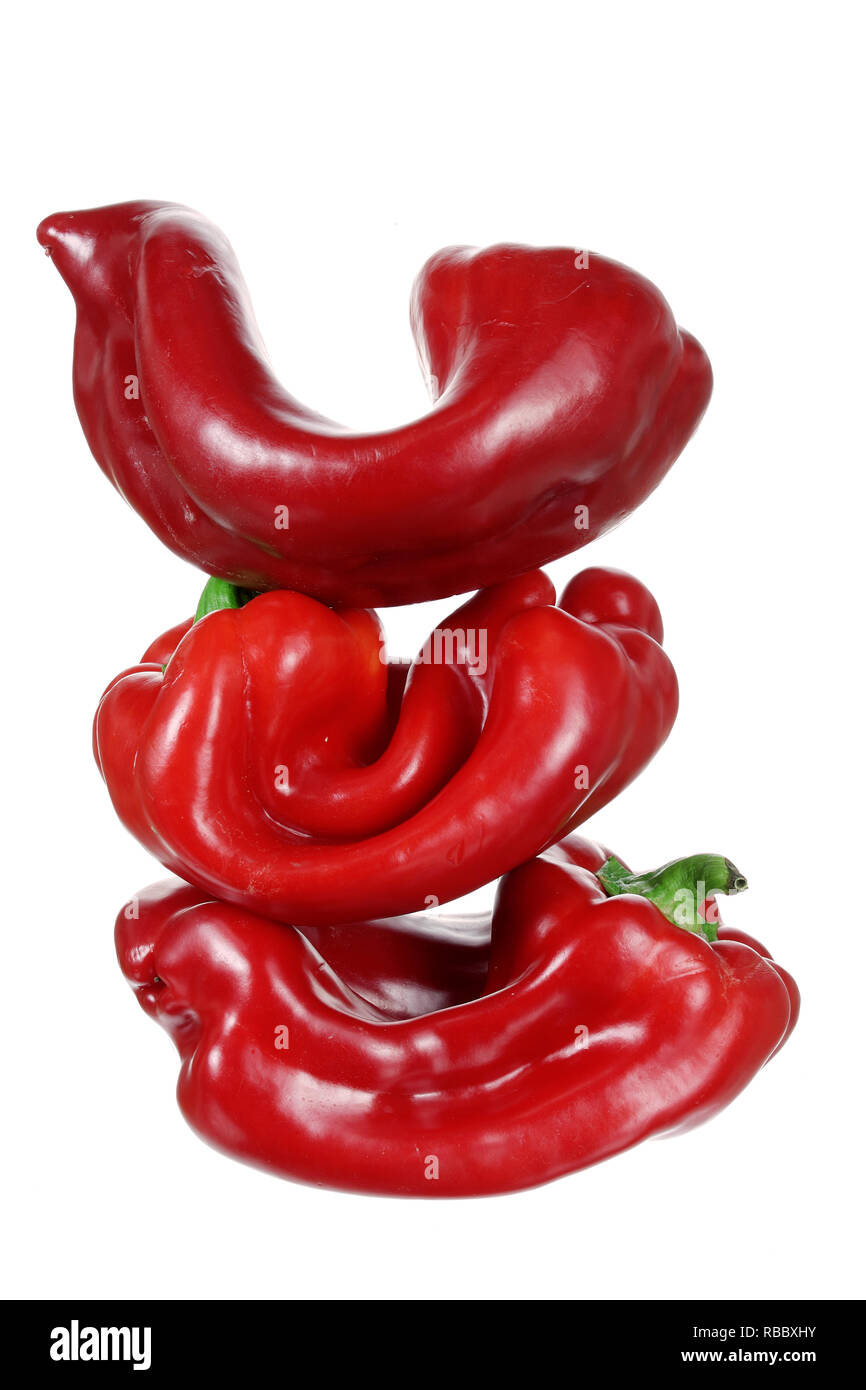Red Capsicums on White Background Stock Photo