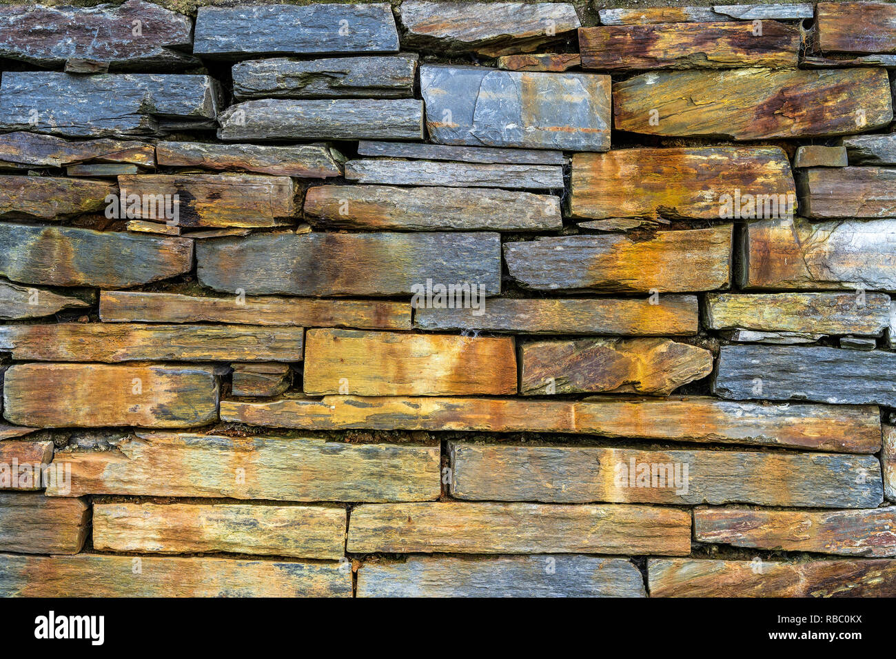 Old rustic stone wall - high quality texture / background Stock Photo
