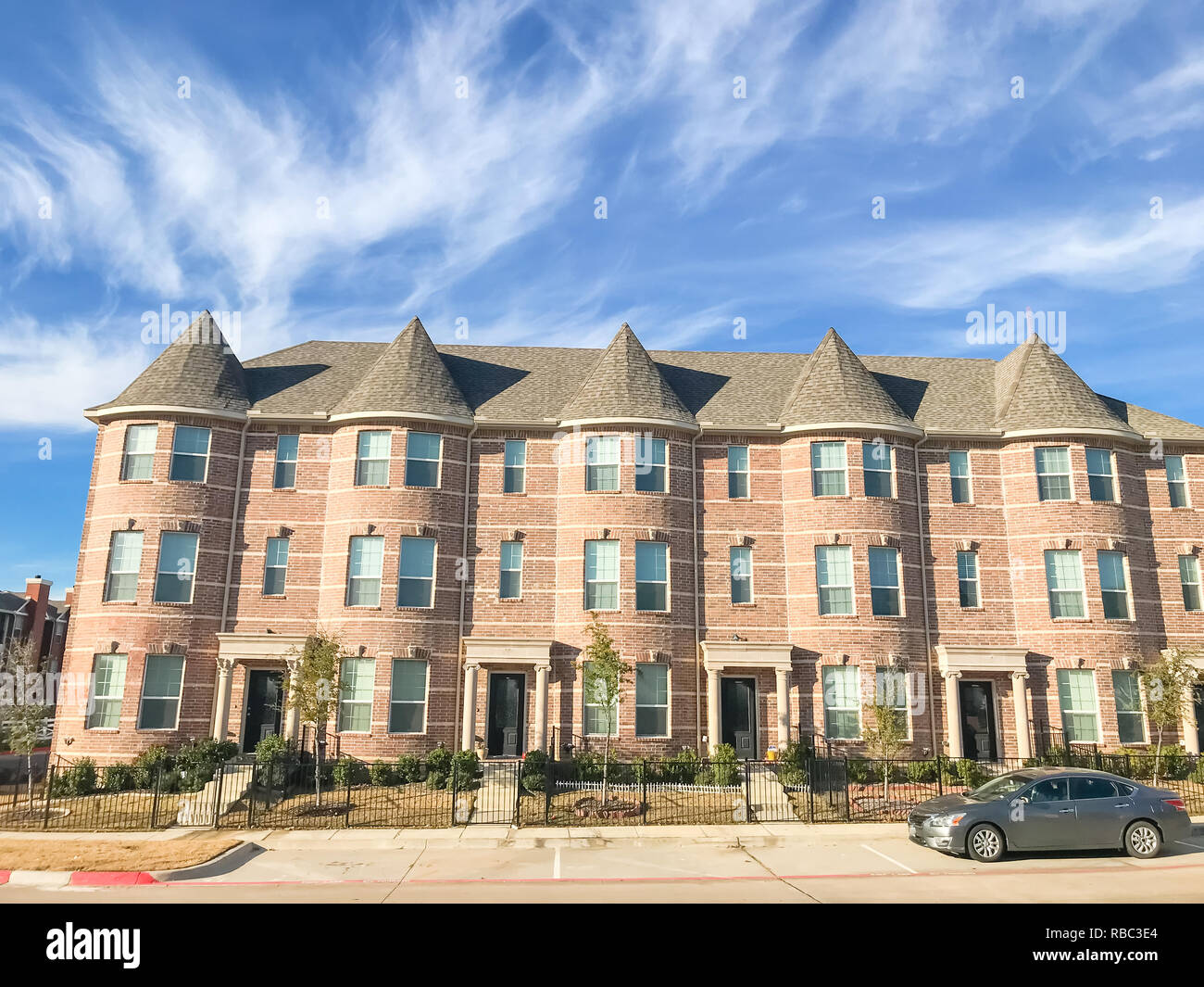 Exterior of new townhouse apartment building near Dallas under c Stock