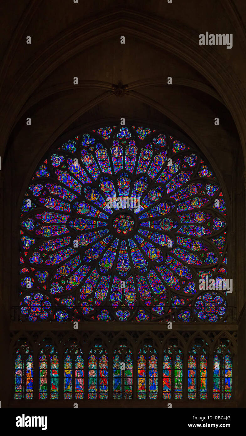 Closeup of stained glass of the oldest rose window in the Notre Dame de