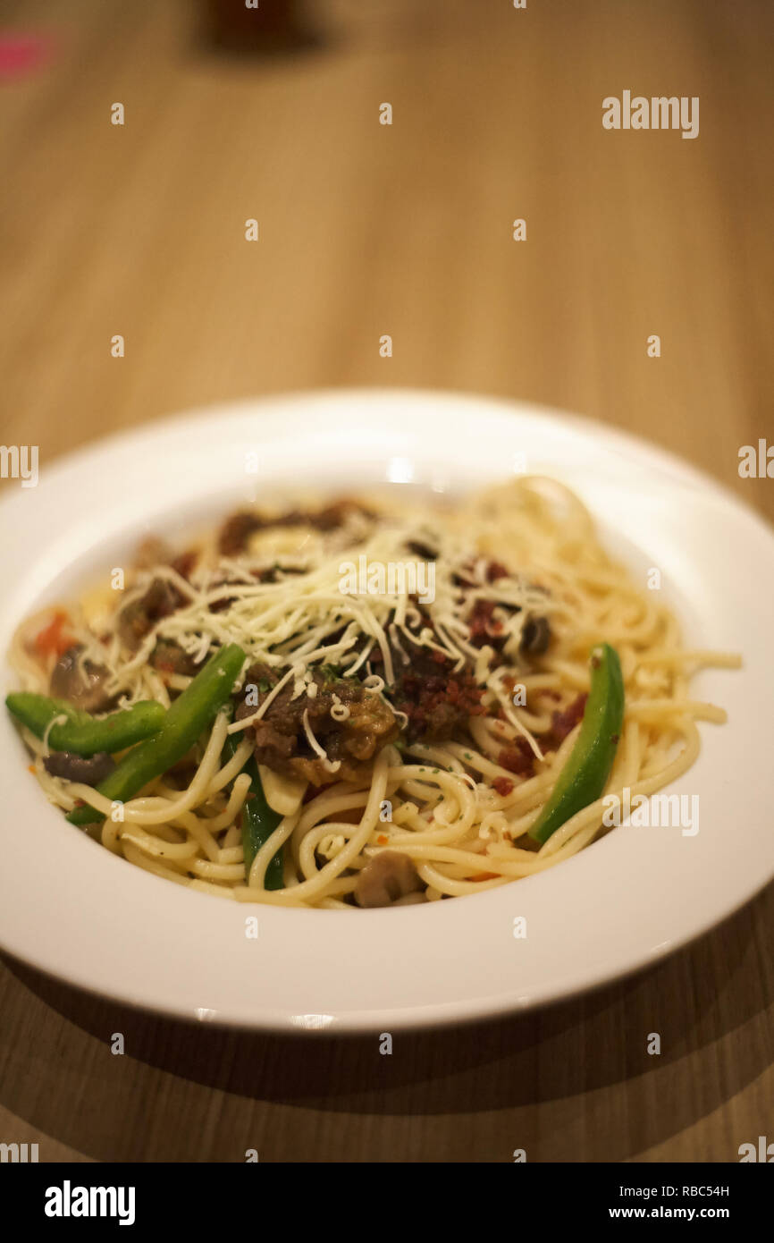 Beef steak aglio olio pasta Stock Photo