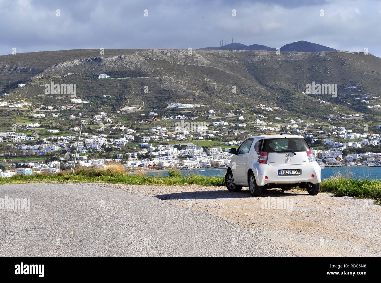 PARIKIA, GREECE - MARCH 23: New Toyota IQ car parked on the hill in Parikia, Greece on March 23, 2018. Stock Photo