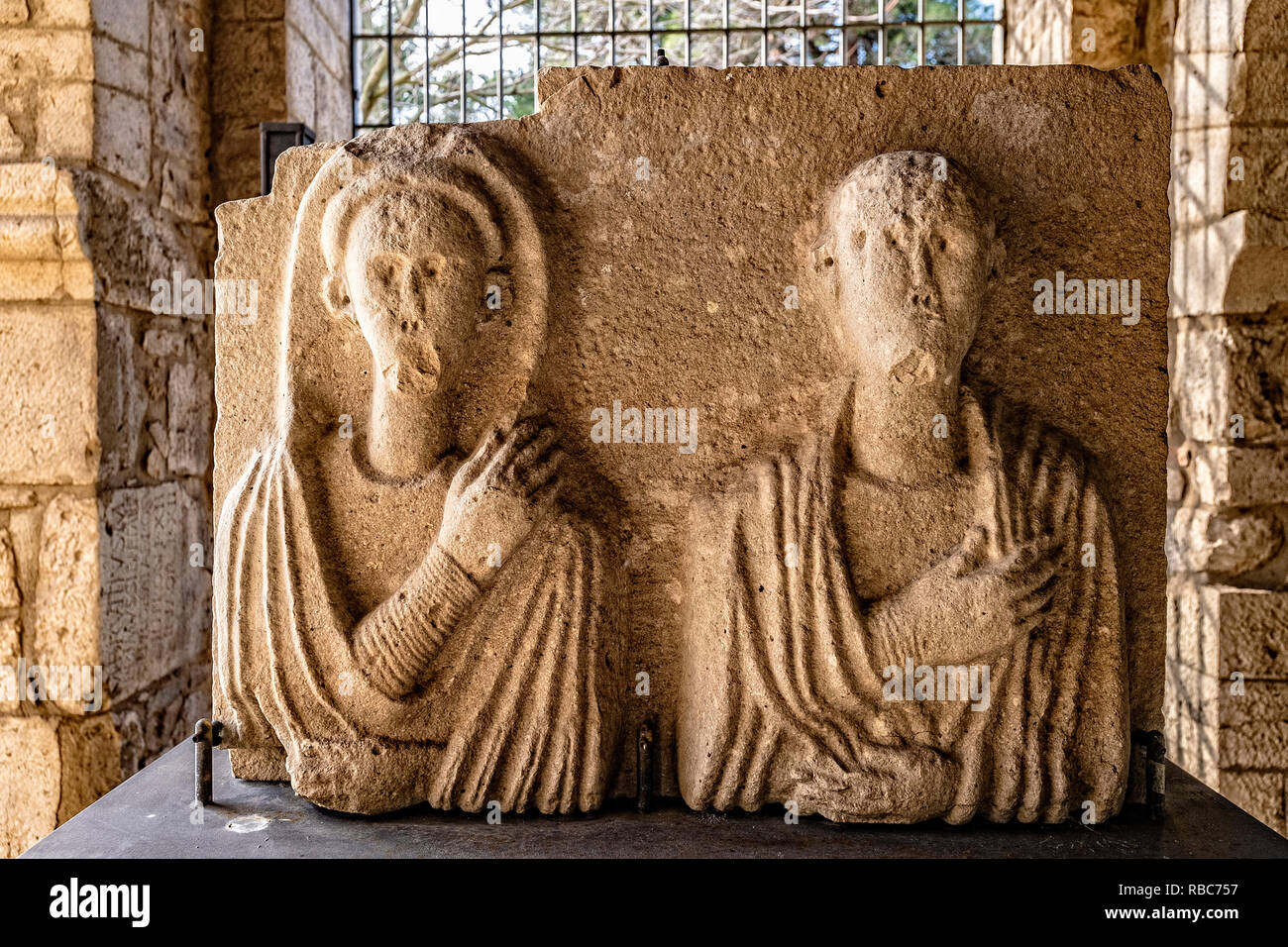 Italy Basilicata Venosa Ss. Trinità and Incompiuta Abbey lapidary museum man and woman togati, Roman age Stock Photo