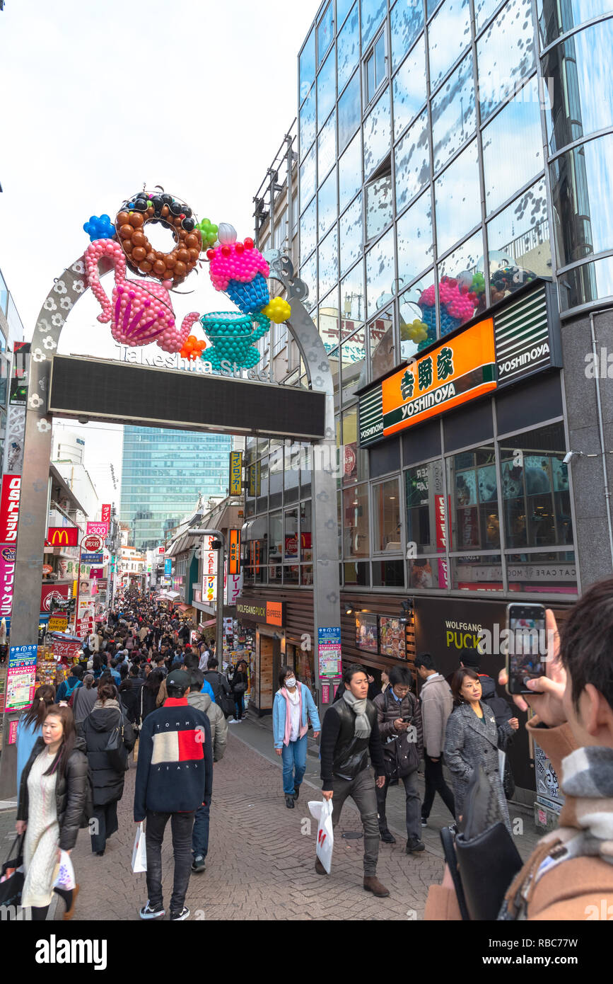 Harajuku street view. People, mostly youngsters, walk through Takeshita Street, a famous shopping street lined with fashion boutiques, cafes and resta Stock Photo