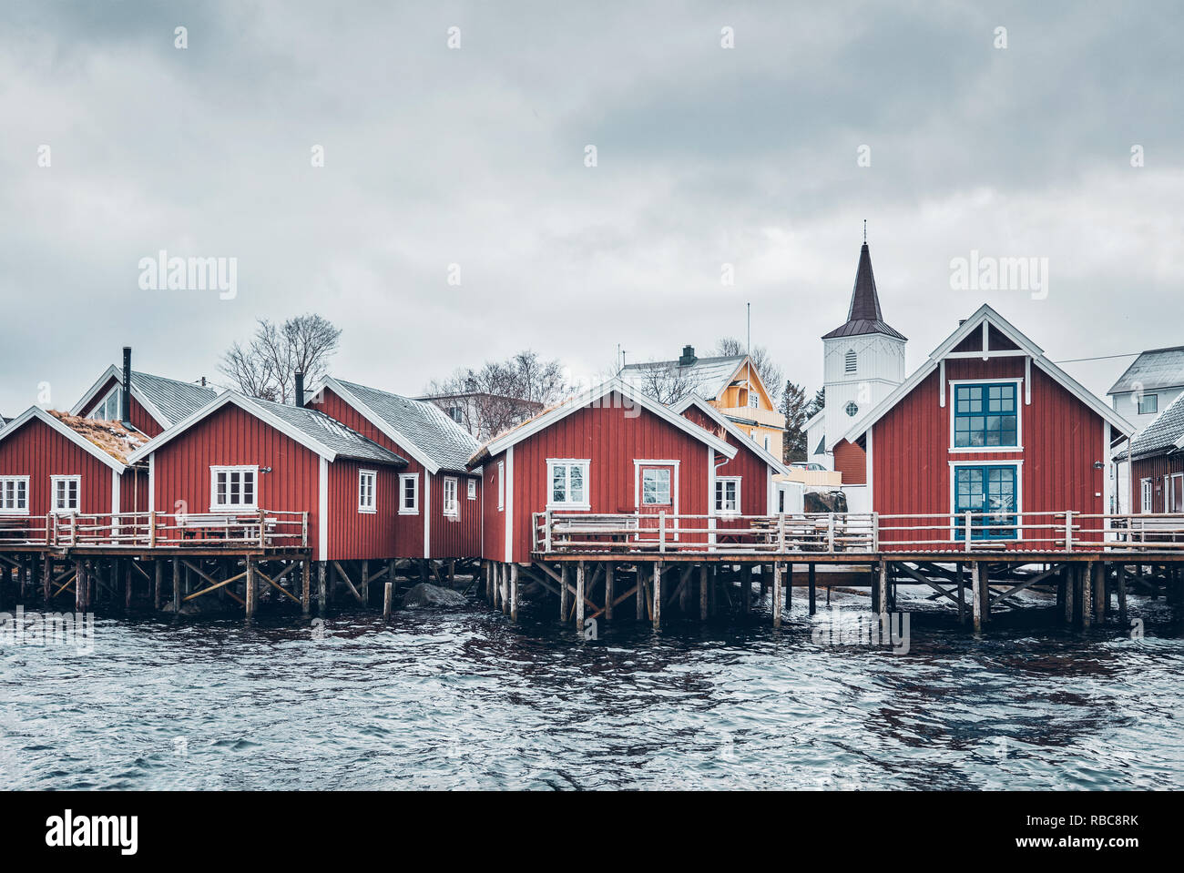 Traditional red rorbu houses in Reine, Norway Stock Photo