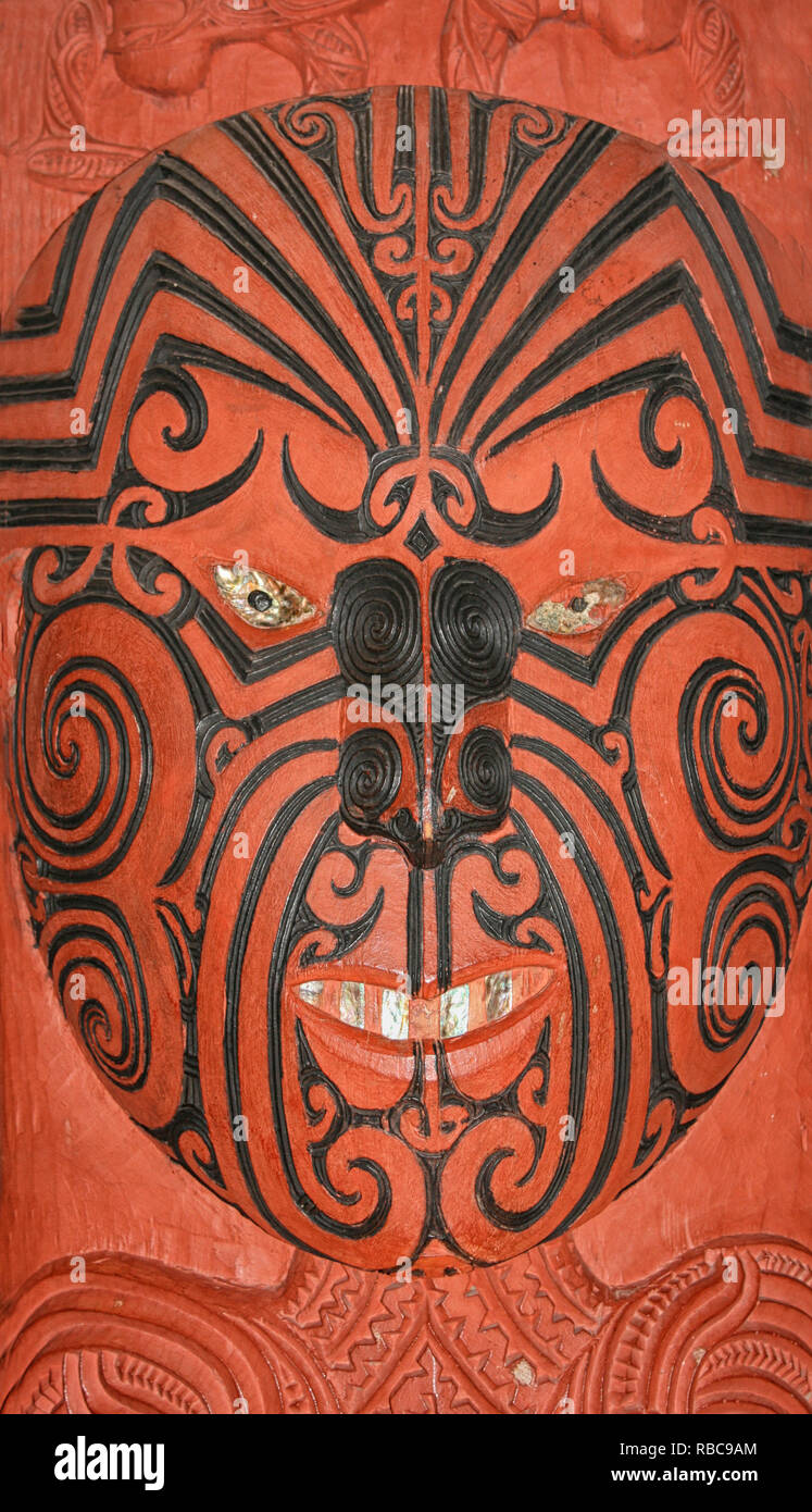 Maori warrior mask  carving in red wood Stock Photo
