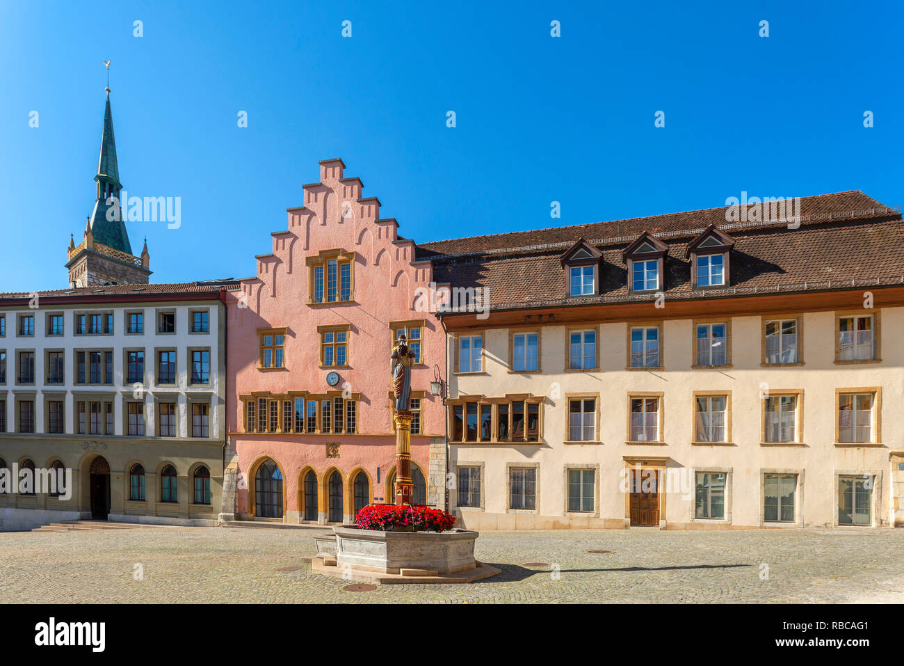 Justice fountain on Burgplatz with City Theater, Biel, Bern, Switzerland Stock Photo