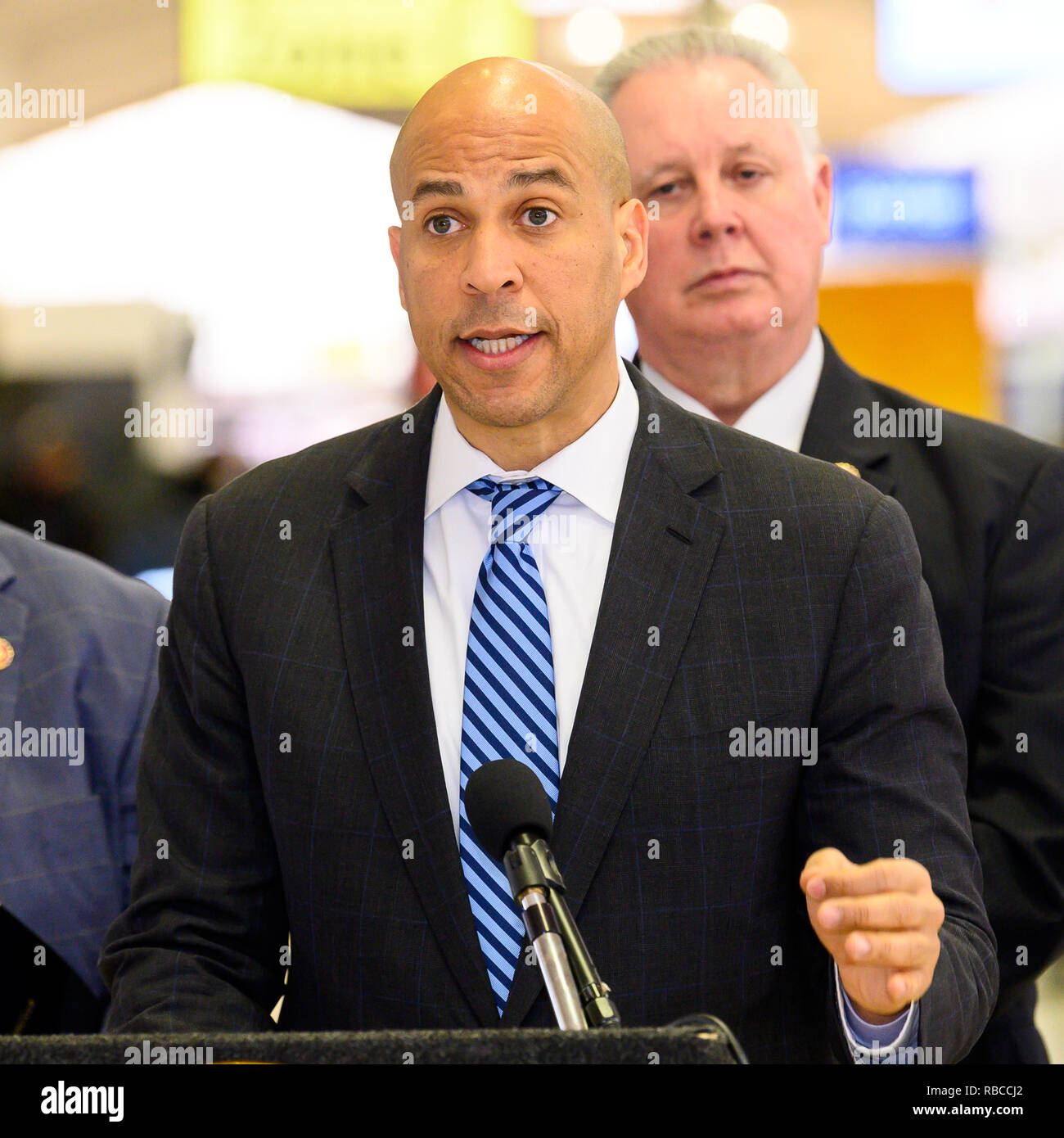 U.S. Senator Cory Booker (D-NJ) seen speaking at a news conference at Newark Liberty International Airport to demand an end to the partial government shutdown leaving thousands of federal workers in New Jersey without pay and to highlight the impacts of lost services being felt statewide. At Newark Liberty International Airport in Newark, New Jersey. Stock Photo