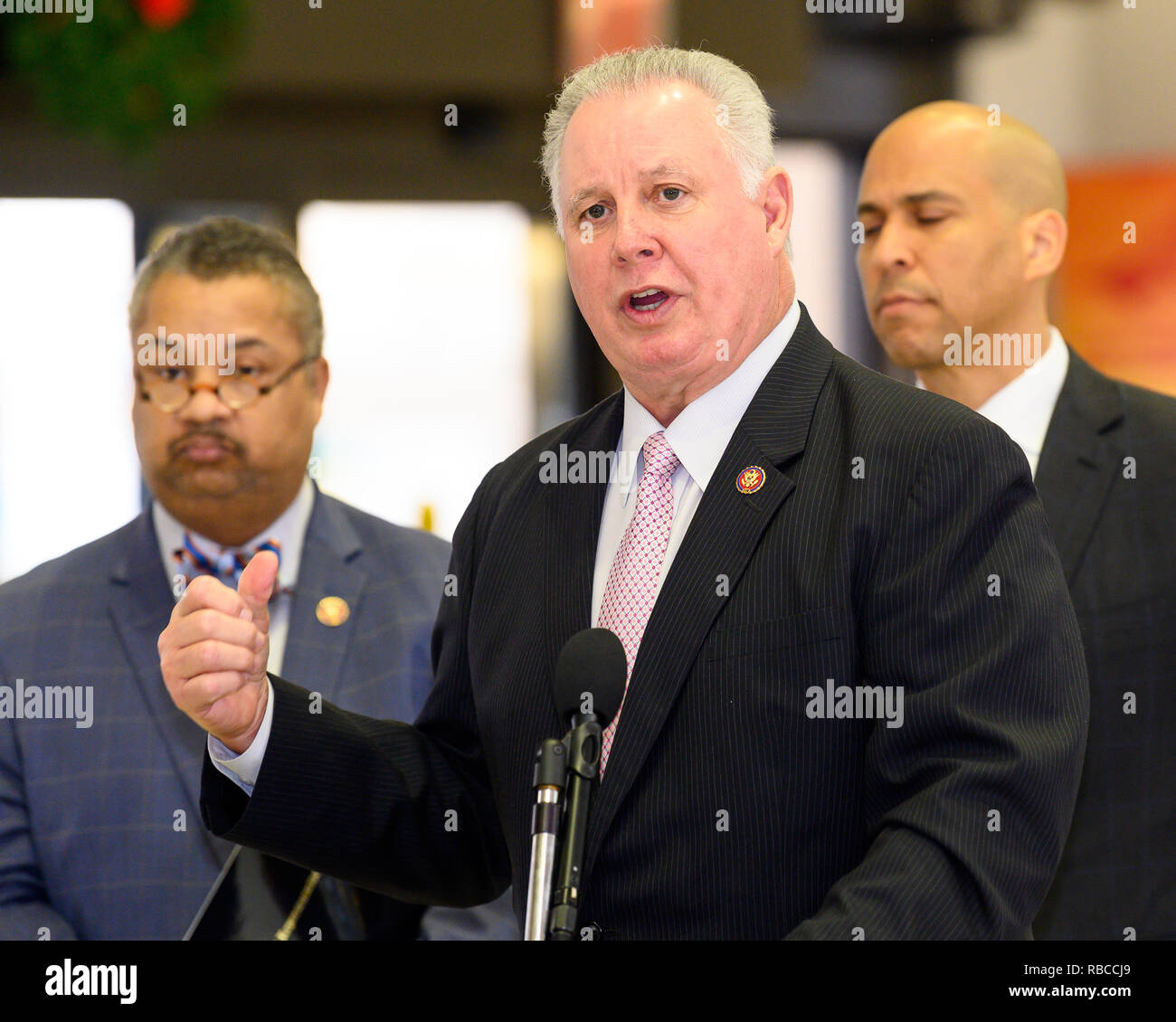 U.S. Representative Albio Sires (D-NJ) seen speaking at a news conference at Newark Liberty International Airport to demand an end to the partial government shutdown leaving thousands of federal workers in New Jersey without pay and to highlight the impacts of lost services being felt statewide. At Newark Liberty International Airport in Newark, New Jersey. Stock Photo