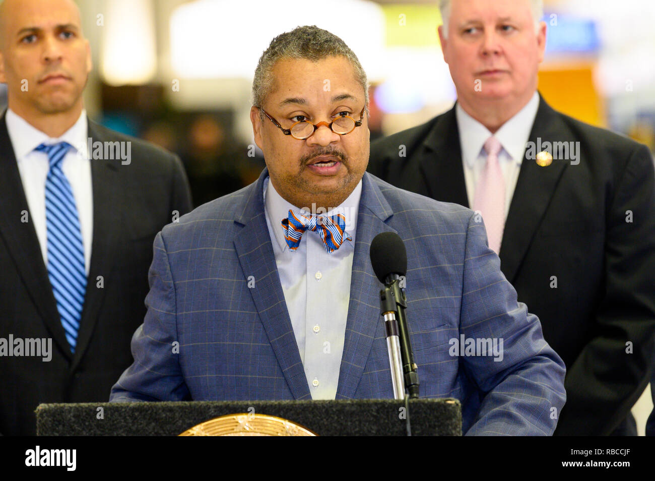 U.S. Representative Donald Payne, Jr. (D-NJ) seen speaking at a news conference at Newark Liberty International Airport to demand an end to the partial government shutdown leaving thousands of federal workers in New Jersey without pay and to highlight the impacts of lost services being felt statewide. At Newark Liberty International Airport in Newark, New Jersey. Stock Photo