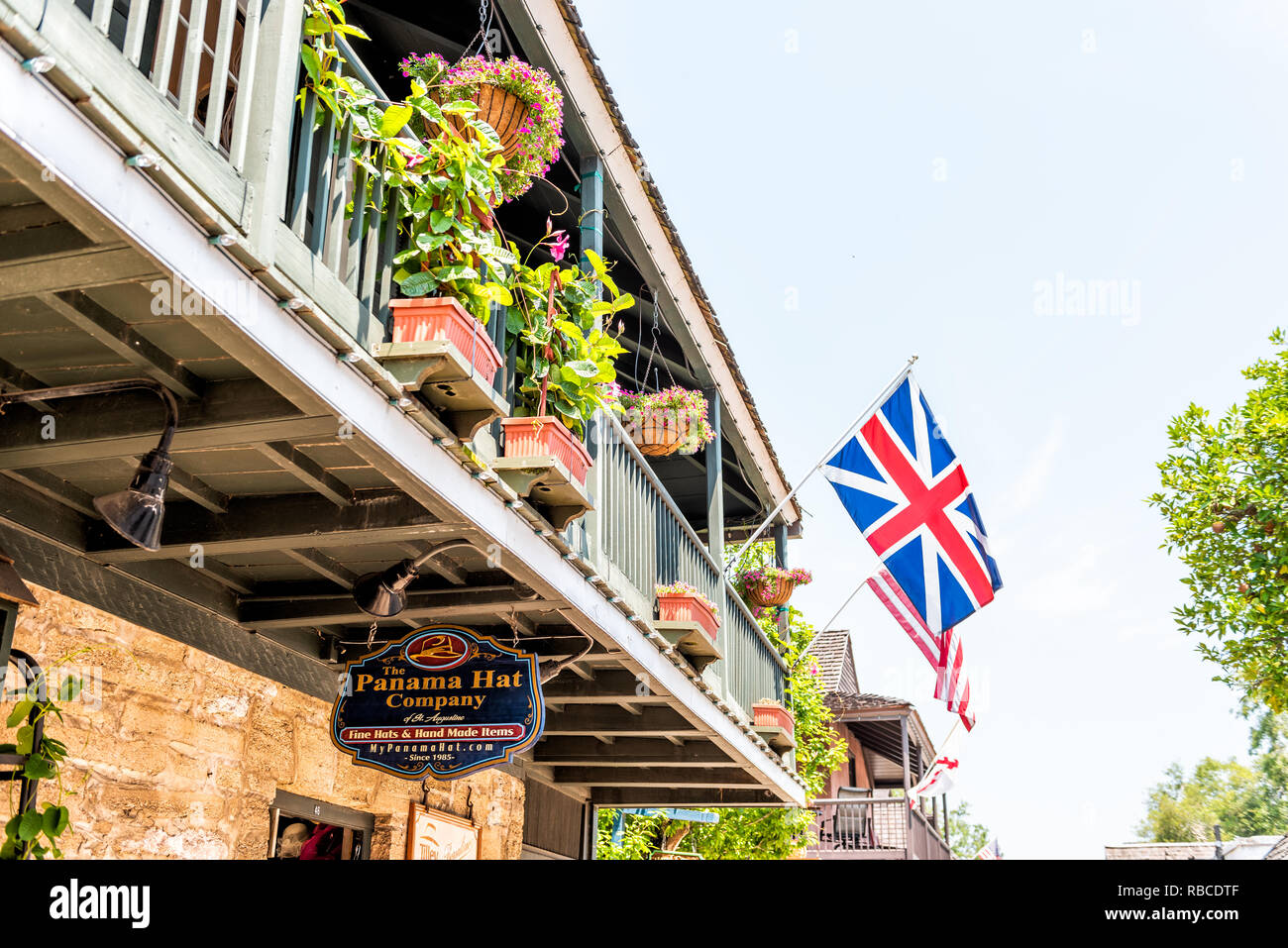 St. Augustine, USA - May 10, 2018: St George Street and nobody on sunny day by English flag pub store in downtown old town Florida city Stock Photo