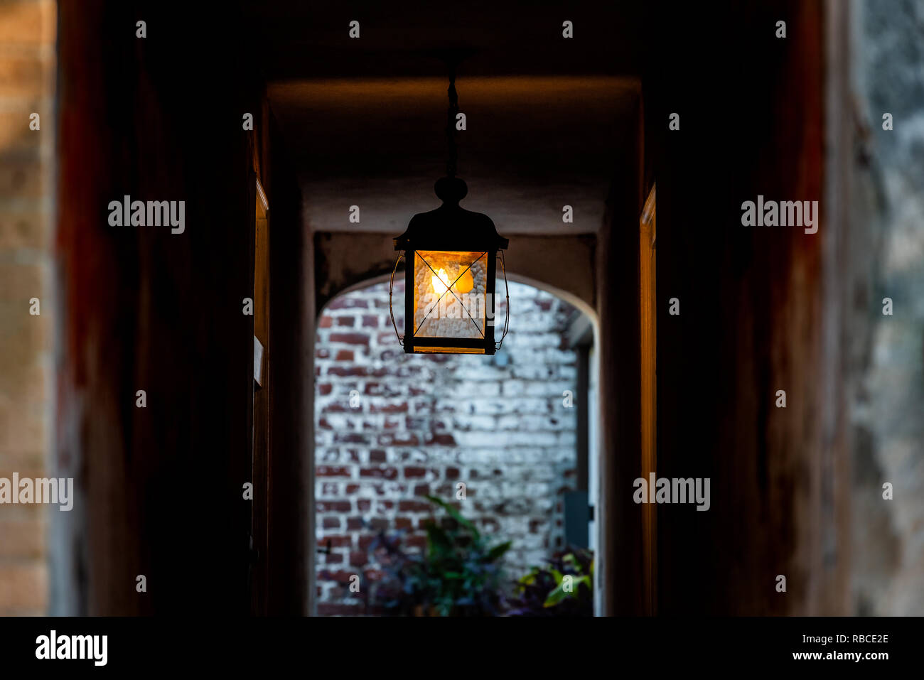Nobody in old vintage stone brick architecture and narrow dark alley
