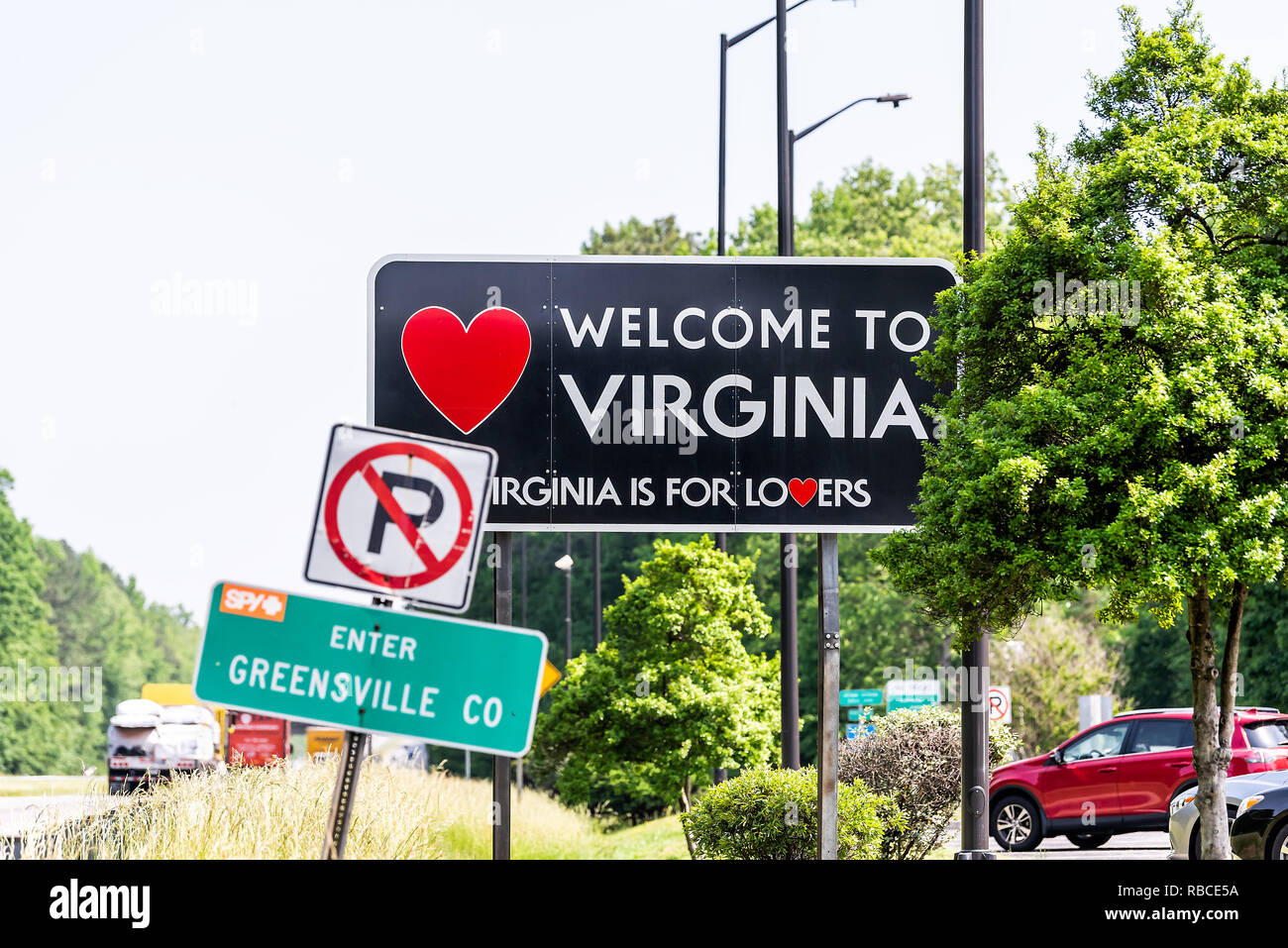 Skippers, USA - May 14, 2018: Highway road with welcome sign by Welcome Center Rest Area with Virginia is For Lovers text Stock Photo