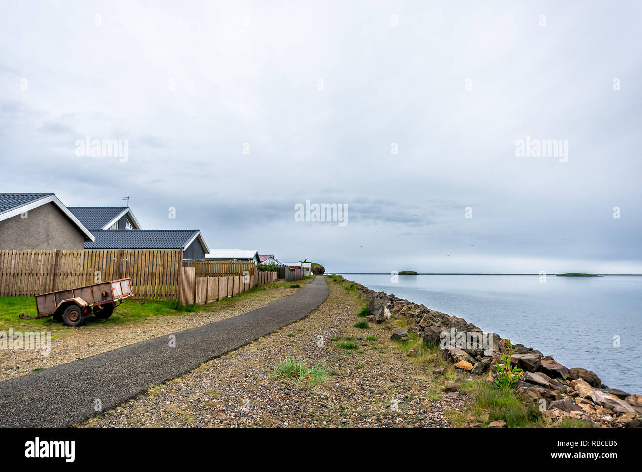 Landscape view of village by fjord water river in fishing town called