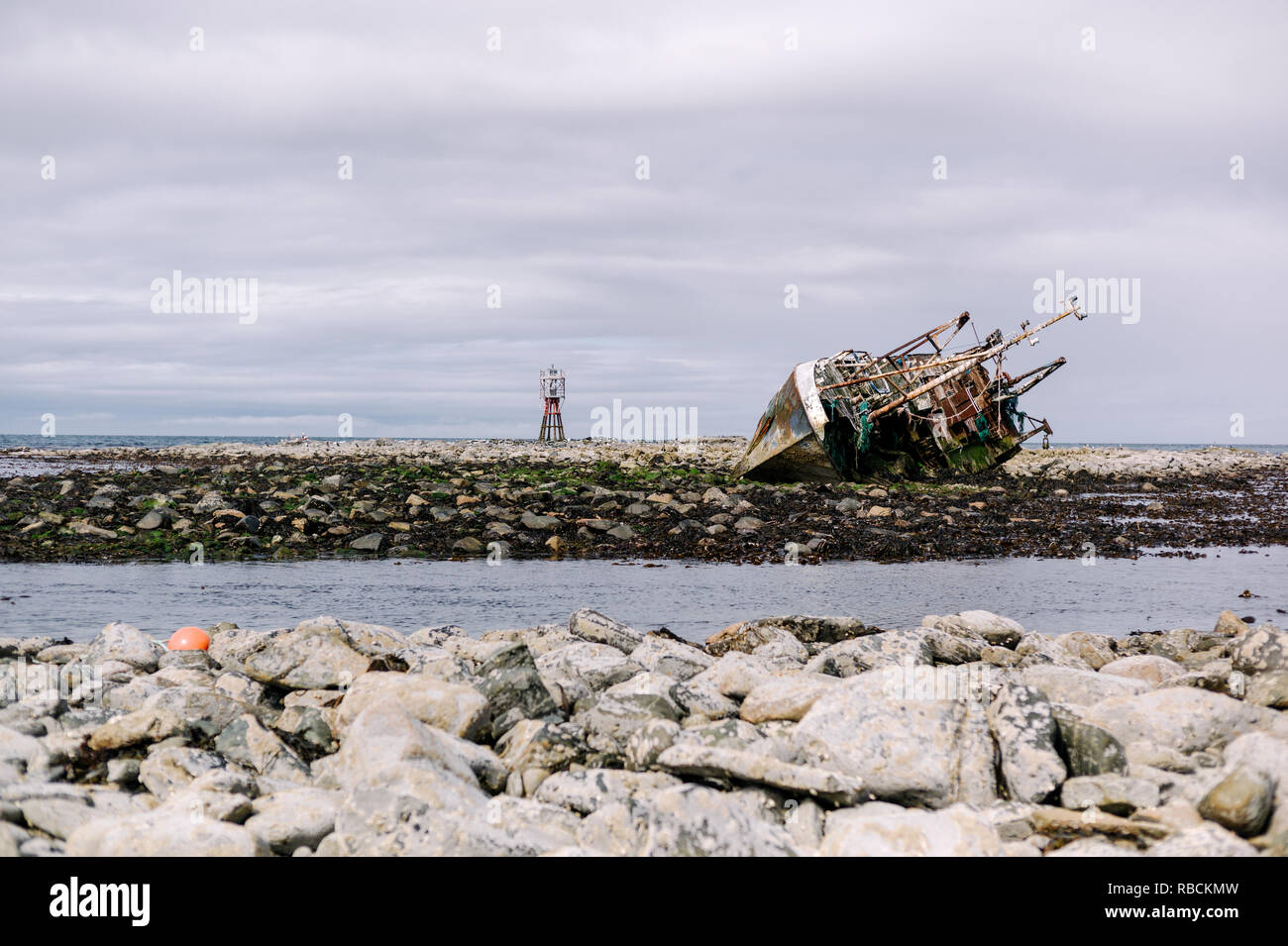 Wreck of Banff Fishing Vessel boat BF 380 aground on rocks after