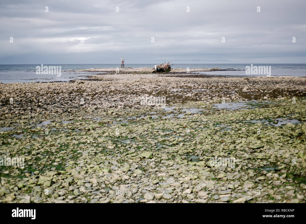 Wreck of Banff Fishing Vessel boat BF 380 aground on rocks after