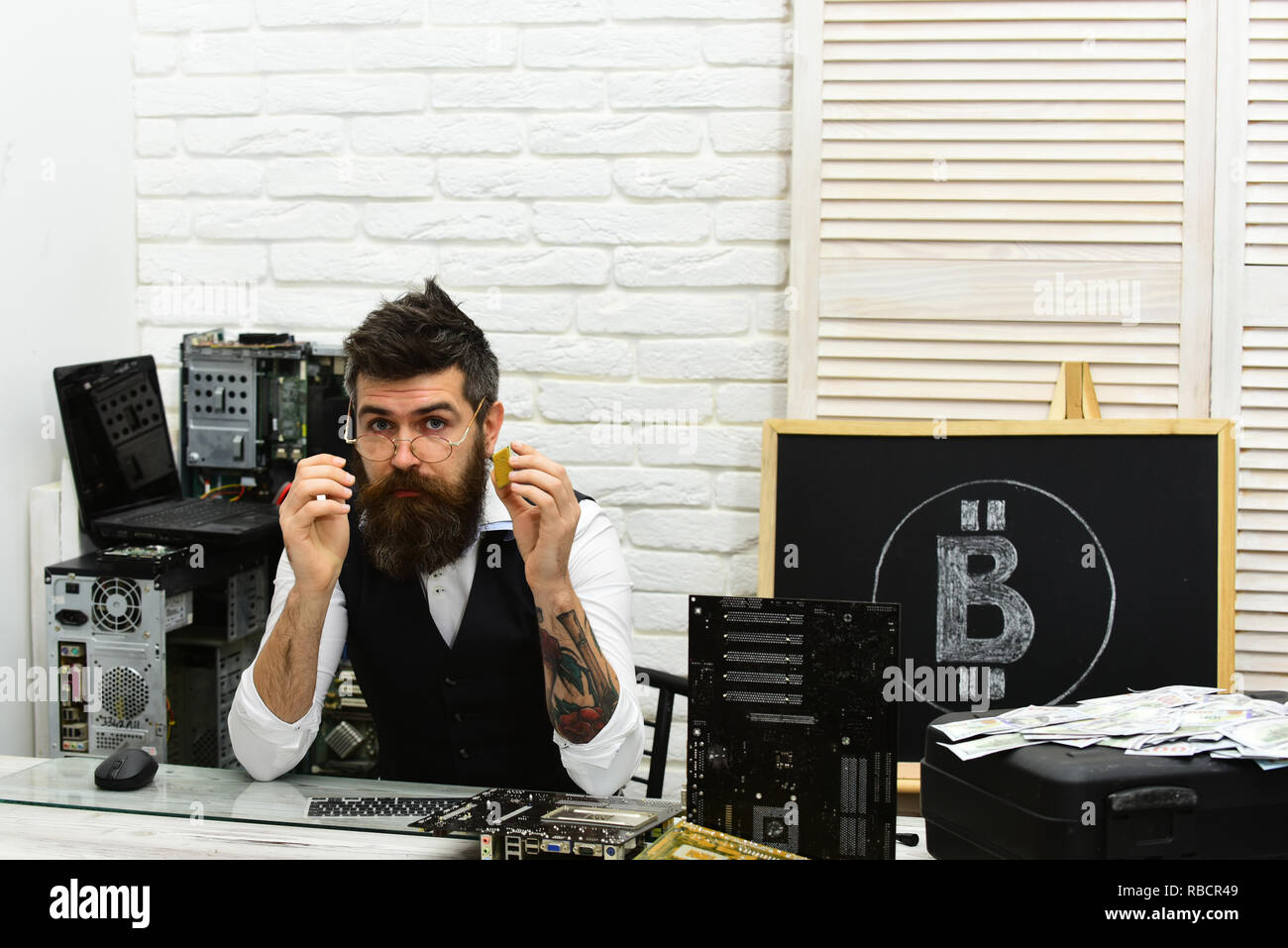 Electronic cash. Bitcoin miner man in server room. Bearded man bitcoiner.  Bearded businessman with computer circuits for bitcoin mining. Crypto  currency mining hardware. Virtual or digital currency Stock Photo - Alamy