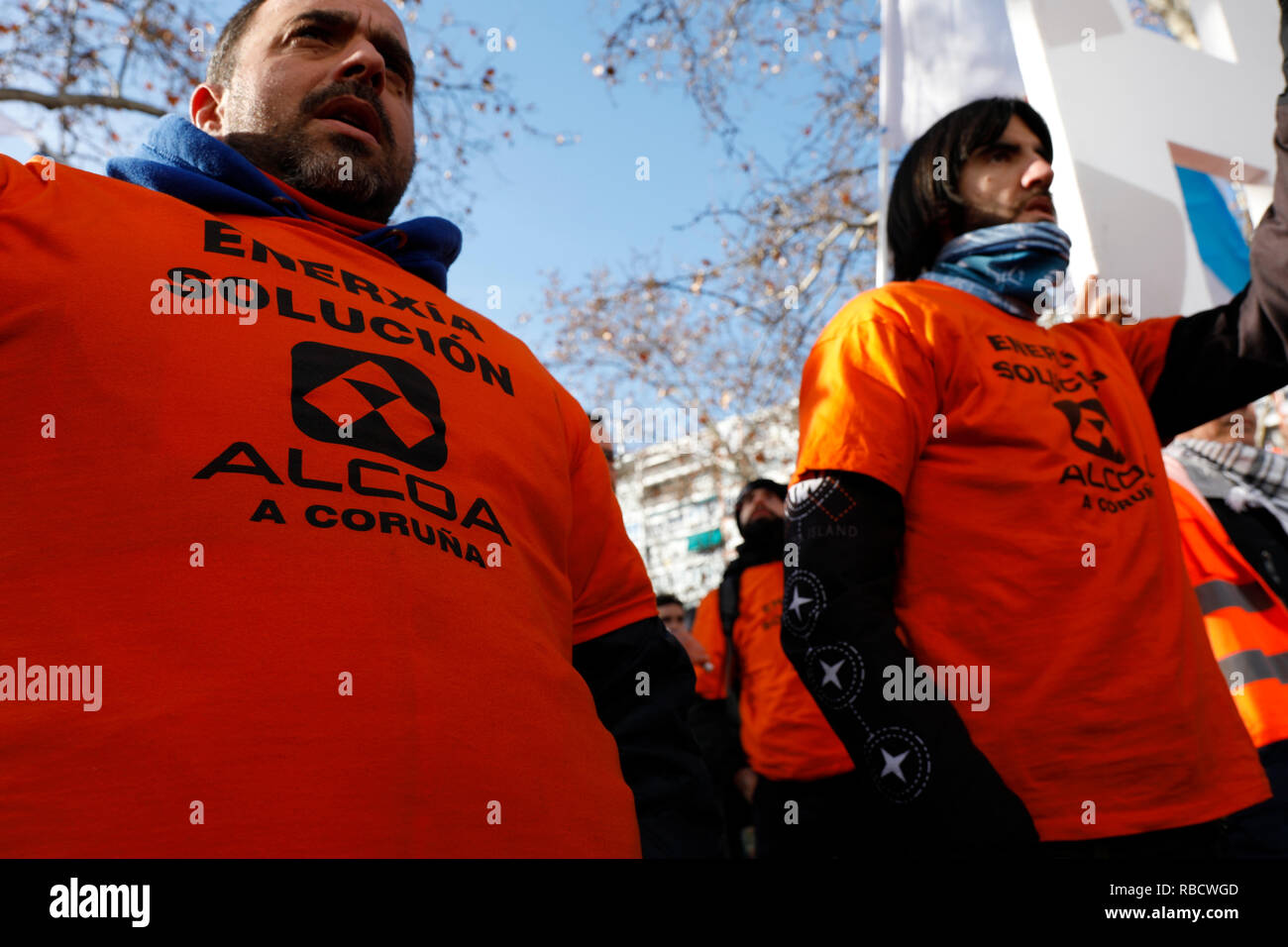 Protesters are seen chanting slogans during the protest. Alcoa workers demonstrate demanding for measures from the Government to prevent the definitive closure of the factories, the demonstration took place in front of the Ministry of Industry, Commerce and Tourism in Madrid Stock Photo