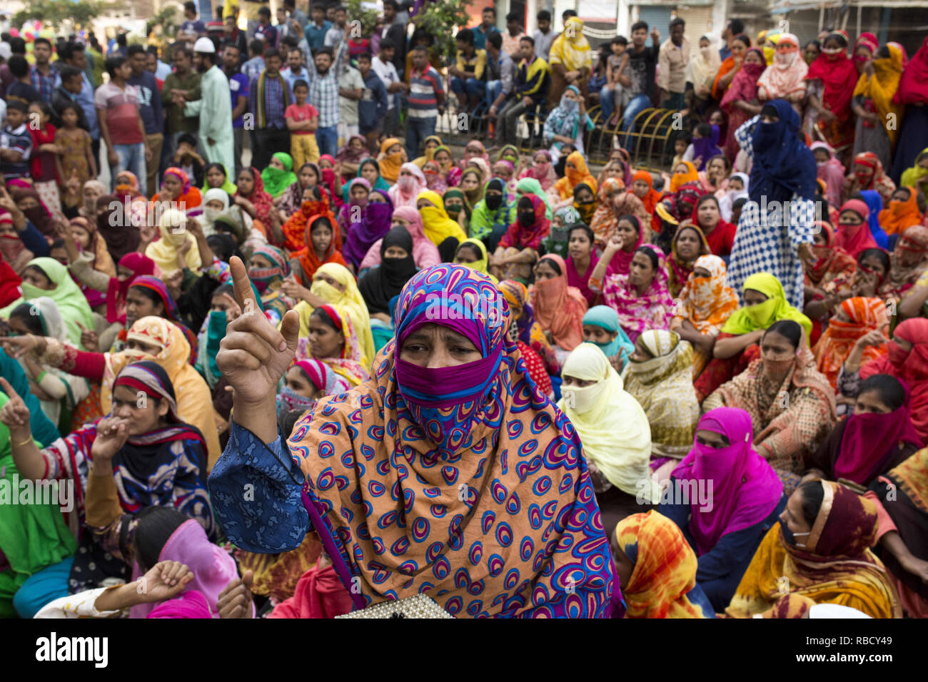 Dhaka, Bangladesh. 9th Jan, 2019. JANUARY 09 : Bangladeshi garments workers gather on the streets of Dhaka demonstration to demand wage hikes in Dhaka, Bangladesh on January 09, 2019.Bangladesh's 4,500 textile and clothing factories exported more than $30 billion worth of apparel last year, making clothing for retailers such as H&M, Walmart, Tesco, Carrefour and Aldi. Credit: Zakir Hossain Chowdhury/ZUMA Wire/Alamy Live News Stock Photo