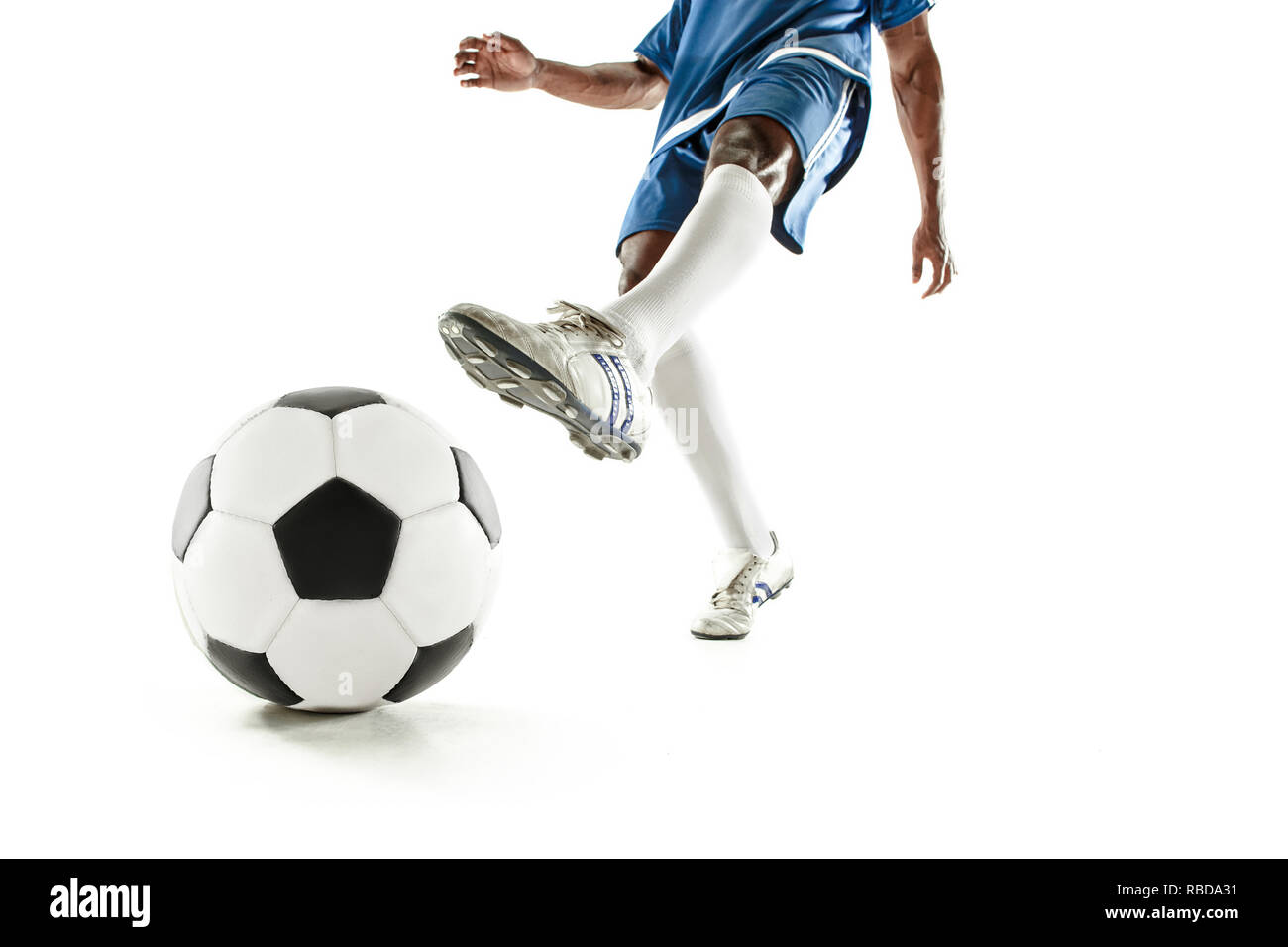 The Legs Of Soccer Player Close Up Isolated On White African American Model In Action Or Movement With Ball The Football Game Sport Player Athlete Competition Concept Stock Photo Alamy