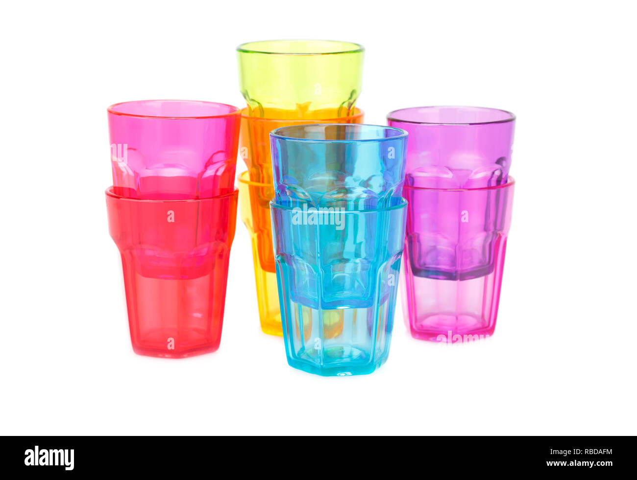Colorful plastic glasses isolated on white background. Stock Photo
