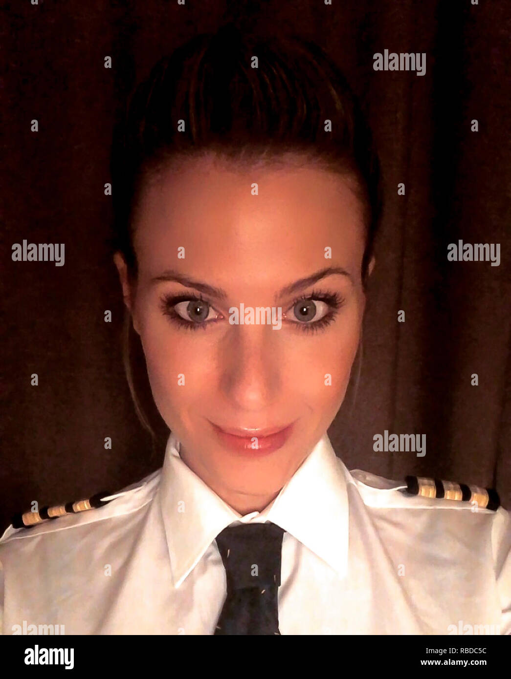Selfie. MEET the stunning pilot whose behind the scenes shots of her job and adventurous lifestyle have made her an Instagram star. First officer Sara Johansson (33), Borås, Sweden has amassed more than 22k followers on the social media site thanks to her incredible images. Striking shots show the beauty queen in her uniform at work in the cockpit or chilling on a plane wing while others show Sara on her days off exploring the exotic locations she gets to fly to. Sara has worked as a commercial pilot for two and a half years, flying both passengers and cargo on a Boeing 737 but is now flying C Stock Photo